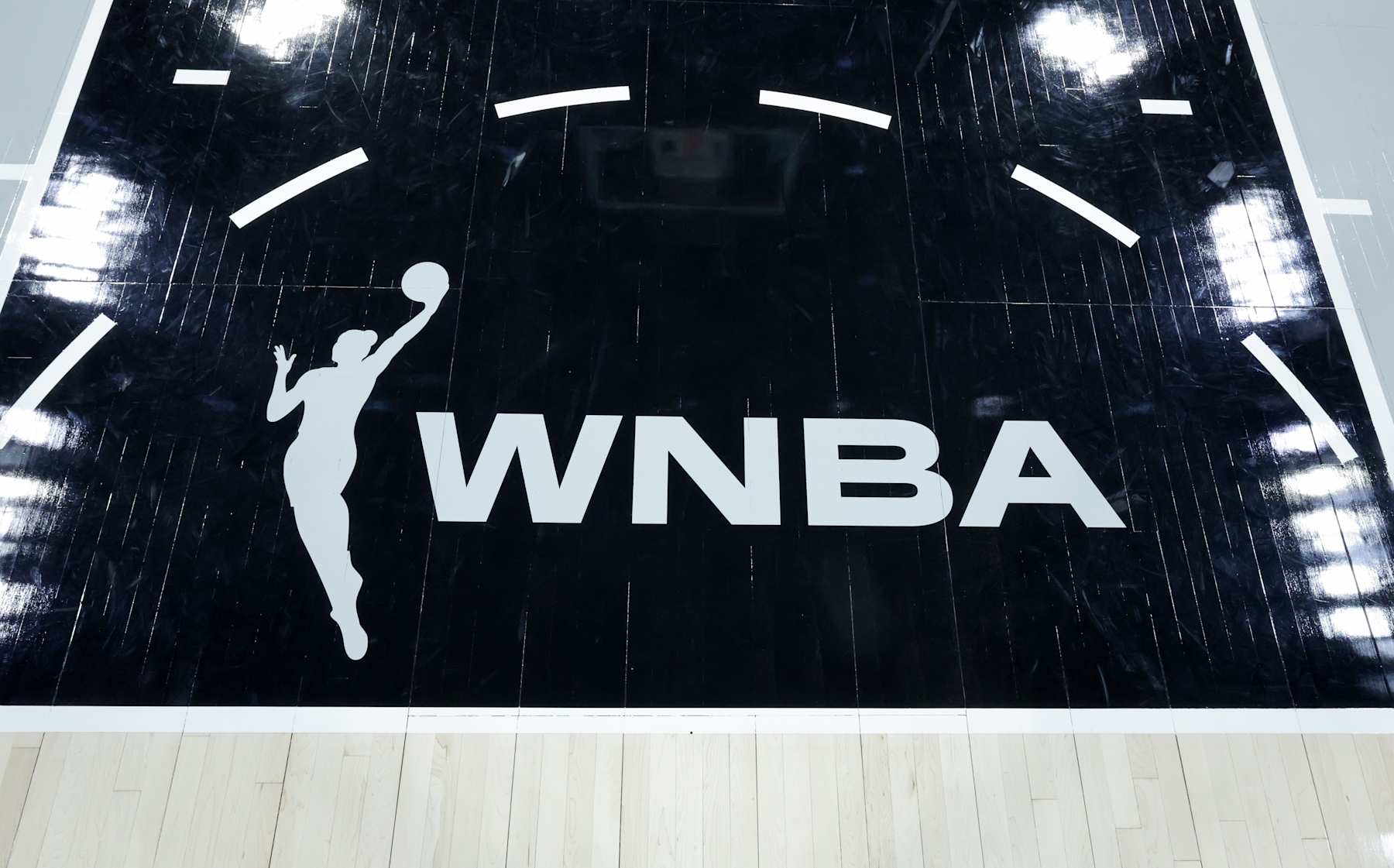LAS VEGAS, NEVADA - MAY 18: A WNBA logo is shown on the court after the Las Vegas Aces' 89-82 victory over the Los Angeles Sparks at Michelob ULTRA Arena on May 18, 2024 in Las Vegas, Nevada. NOTE TO USER: User expressly acknowledges and agrees that, by downloading and or using this photograph, User is consenting to the terms and conditions of the Getty Images License Agreement. (Photo by Ethan Miller/Getty Images)