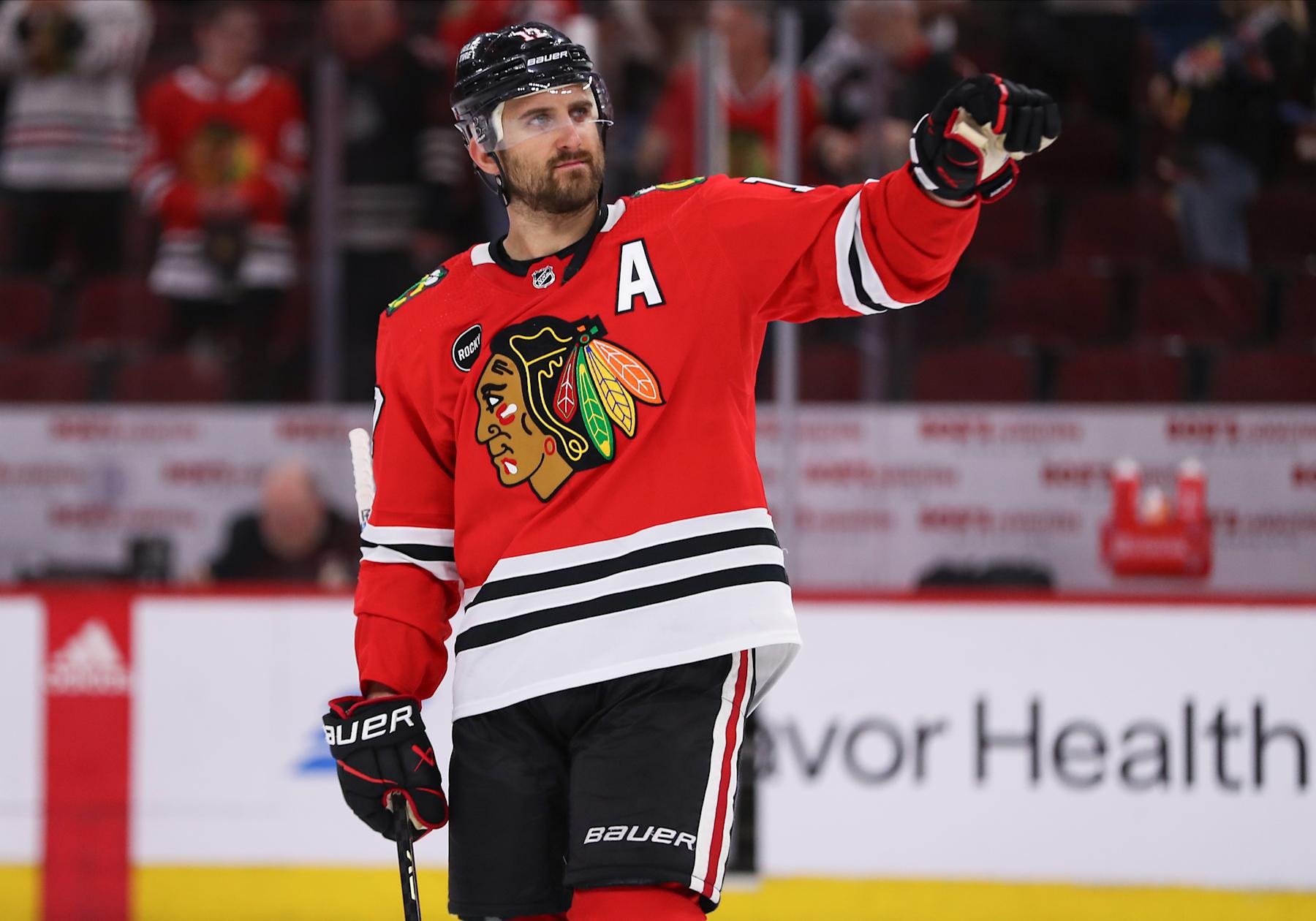 CHICAGO, IL - APRIL 14: Nick Foligno #17 of the Chicago Blackhawks points to the crowd after a game against the Carolina Hurricanes at the United Center on April 14, 2024 in Chicago, Illinois. (Photo by Melissa Tamez/Icon Sportswire via Getty Images)