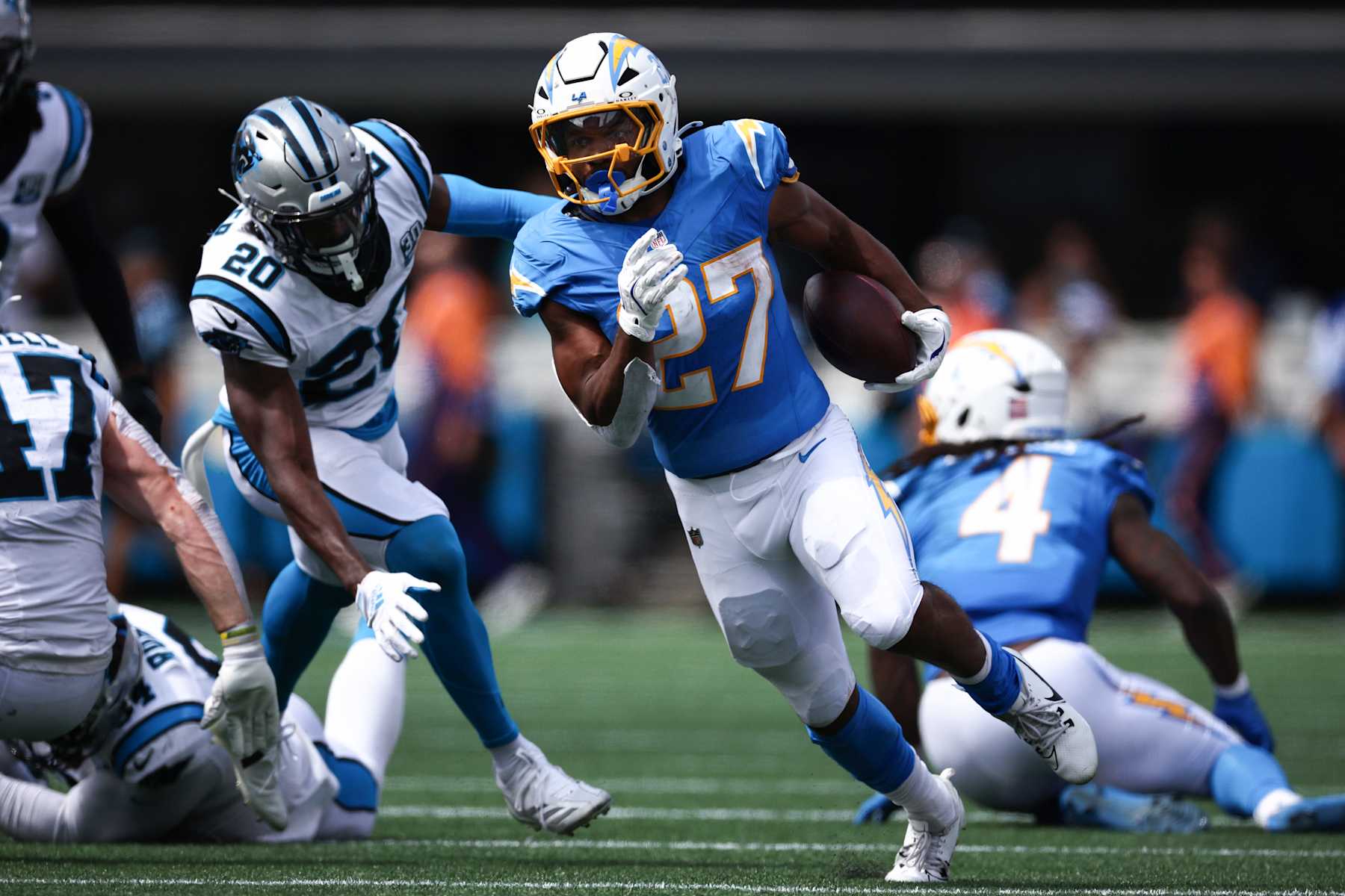 CHARLOTTE, NORTH CAROLINA - SEPTEMBER 15: J.K. Dobbins #27 of the Los Angeles Chargers runs with the ball during the second quarter against the Carolina Panthers at Bank of America Stadium on September 15, 2024 in Charlotte, North Carolina. (Photo by Jared C. Tilton/Getty Images)