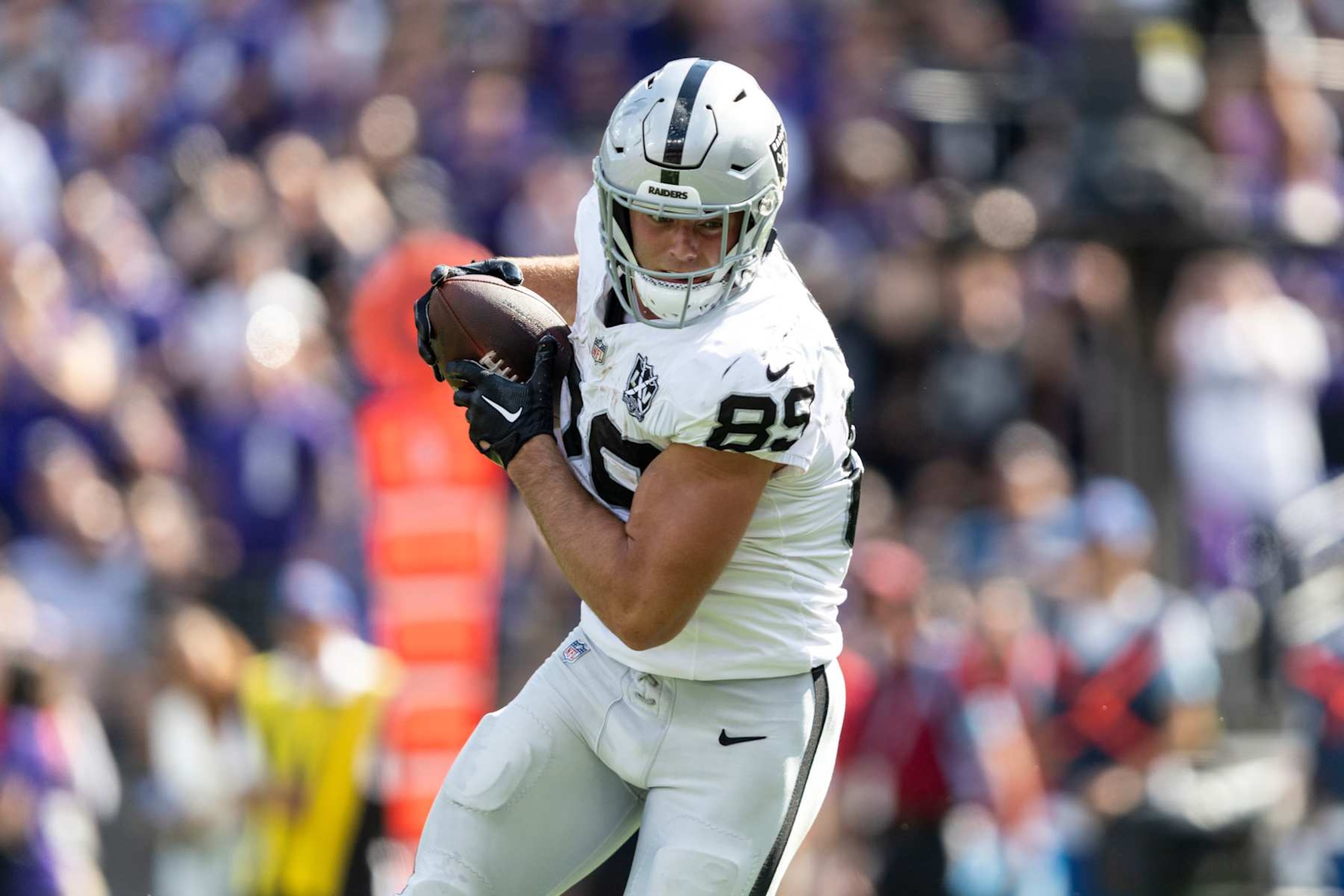 BALTIMORE, MARYLAND - SEPTEMBER 15: Brock Bowers #89 of the Las Vegas Raiders completes a pass during an NFL football game between the Baltimore Ravens and the Las Vegas Raiders at M&T Bank Stadium on September 15, 2024 in Baltimore, Maryland. (Photo by Michael Owens/Getty Images)