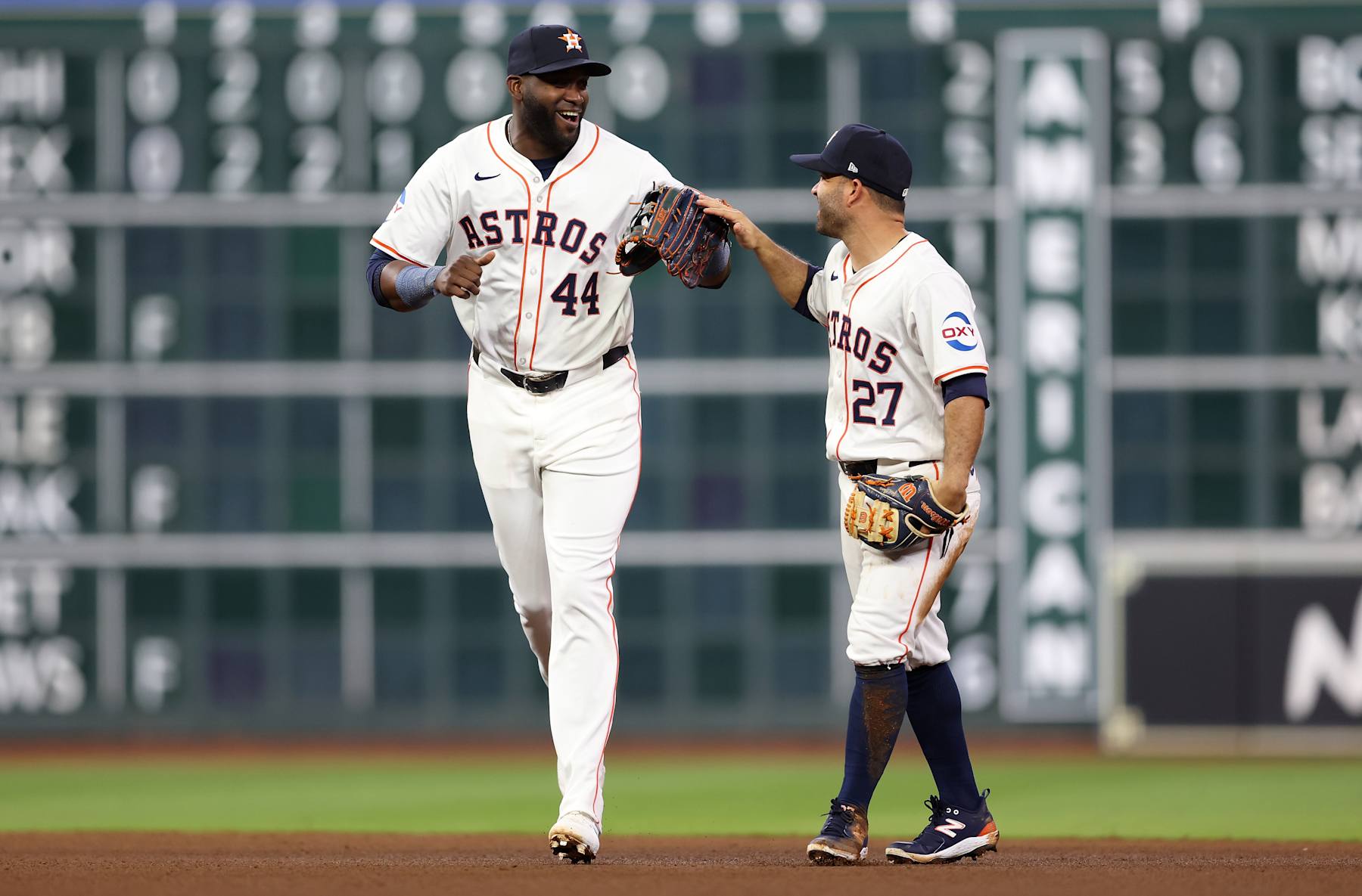HOUSTON, TEXAS - MARCH 30: Jose Altuve #27 of the Houston Astros congratulates Yordan Alvarez #44 in the sixth inning against the New York Yankees at Minute Maid Park on March 30, 2024 in Houston, Texas. (Photo by Tim Warner/Getty Images)