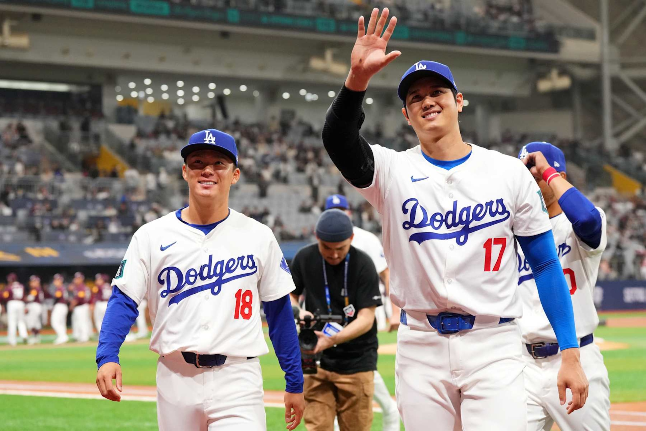 SEOUL, SOUTH KOREA - MARCH 17: Yoshinobu Yamamoto #18 and Shohei Ohtani #17 of the Los Angeles Dodgers applaud fans prior to the exhibition game between Los Angeles Dodgers and Kiwoom Heroes at Gocheok Sky Dome on March 17, 2024 in Seoul, South Korea. (Photo by Masterpress/Getty Images)