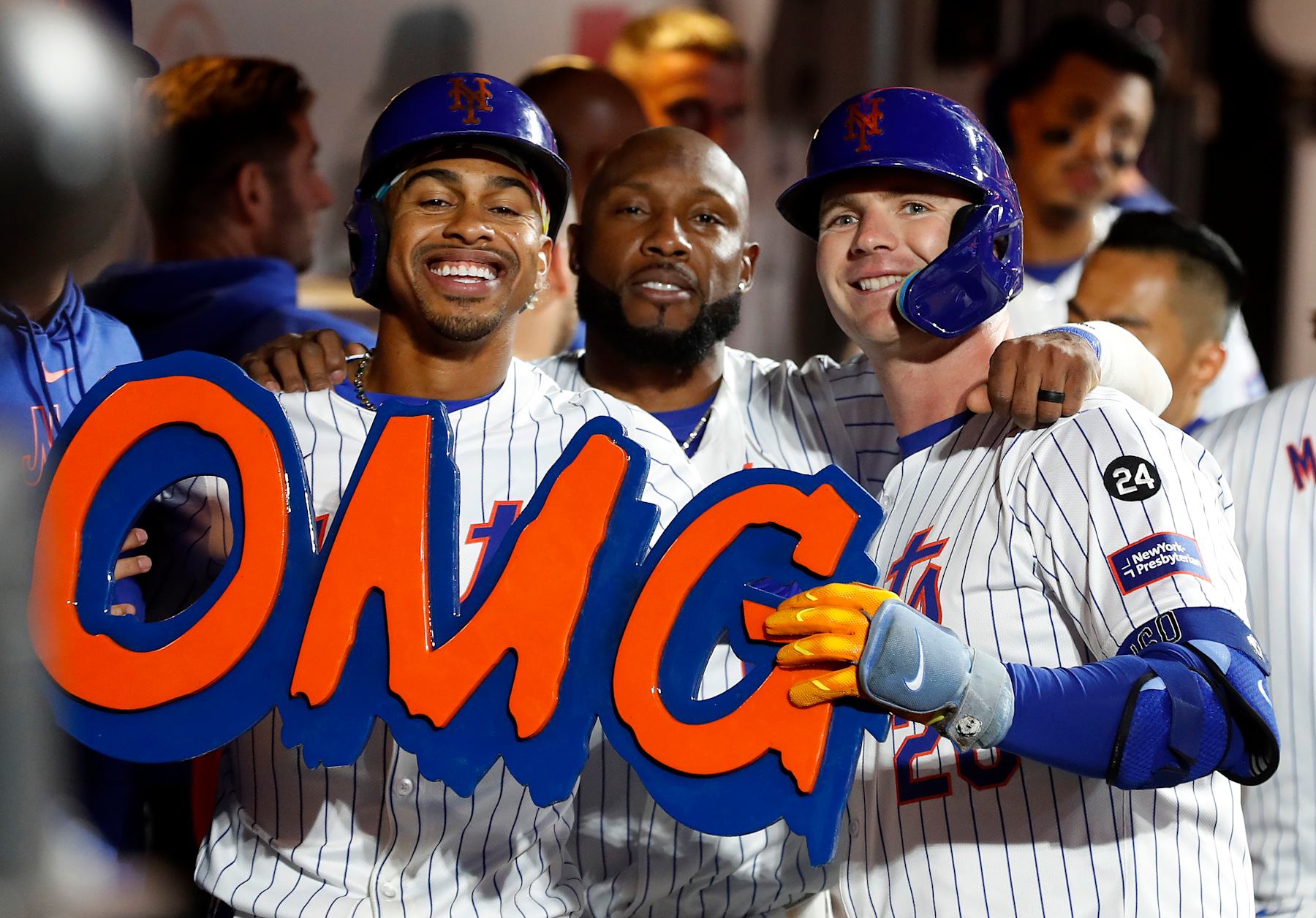 NEW YORK, NEW YORK - SEPTEMBER 03:  Pete Alonso #20 (R) of the New York Mets celebrates his eighth inning two run home run against the Boston Red Sox with teammates Francisco Lindor #12 (L) and Starling Marte #6 at Citi Field on September 03, 2024 in New York City. (Photo by Jim McIsaac/Getty Images)