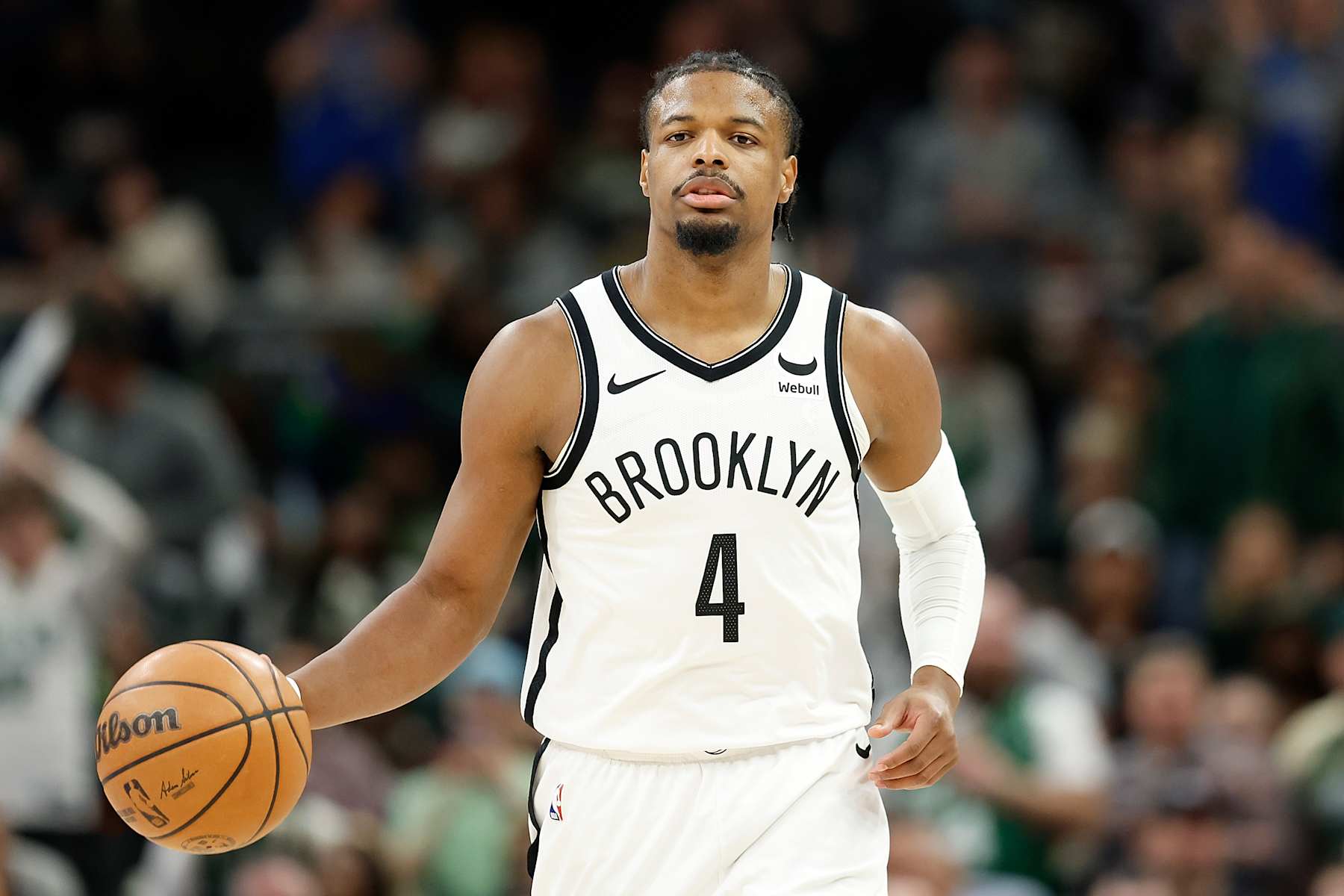 MILWAUKEE, WISCONSIN - MARCH 21: Dennis Smith Jr. #4 of the Brooklyn Nets dribbles up court during the second half of the game against the Milwaukee Bucks at Fiserv Forum on March 21, 2024 in Milwaukee, Wisconsin. NOTE TO USER: User expressly acknowledges and agrees that, by downloading and or using this photograph, User is consenting to the terms and conditions of the Getty Images License Agreement. (Photo by John Fisher/Getty Images)