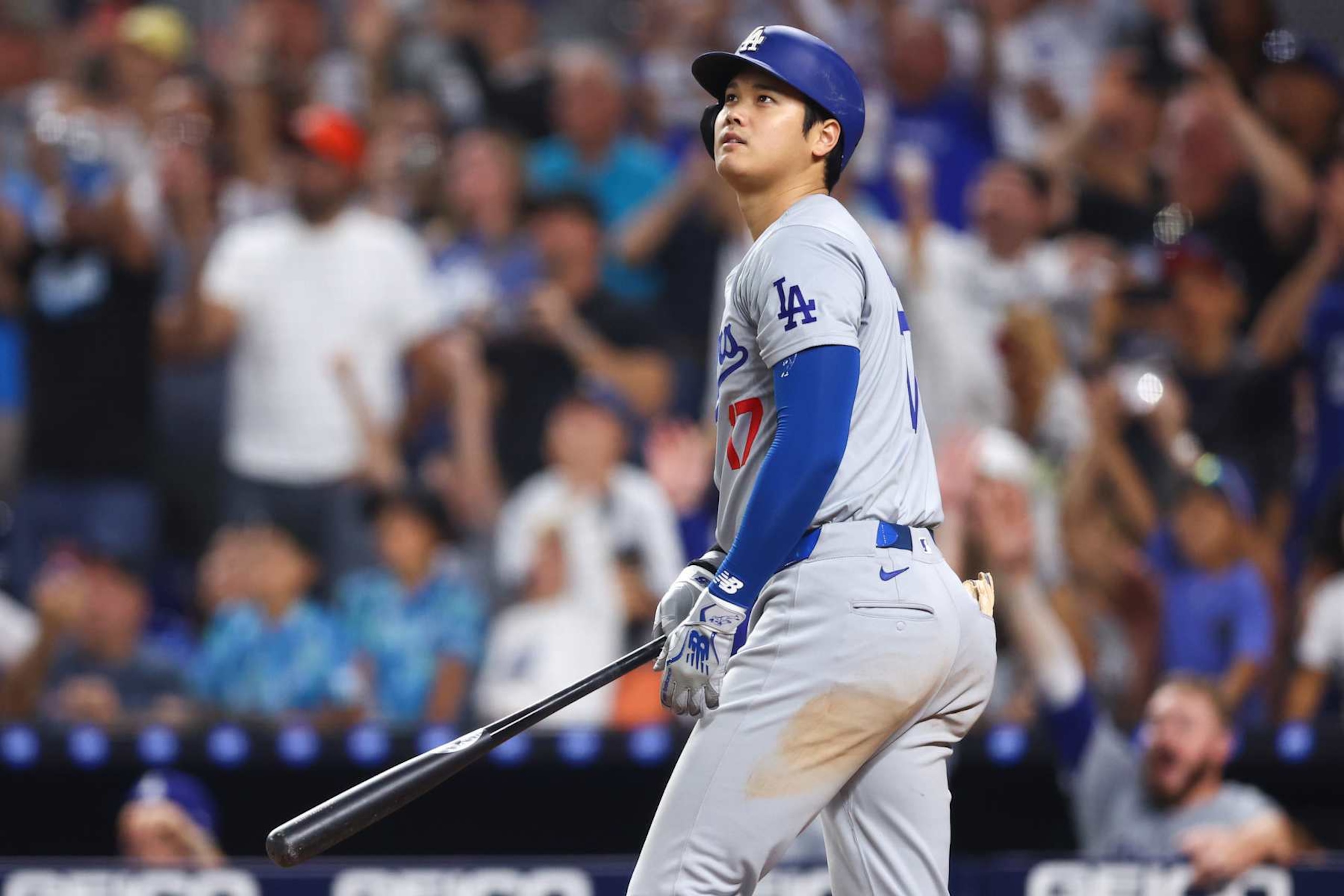 MIAMI, FLORIDA - SEPTEMBER 19: Shohei Ohtani #17 of the Los Angeles Dodgers hits a two-run home run, his 50th of the season, during the seventh inning against the Miami Marlins at loanDepot park on September 19, 2024 in Miami, Florida.  Ohtani is now the first MLB player to have at least 50 home runs and 50 stolen bases in the same season. (Photo by Megan Briggs/Getty Images)