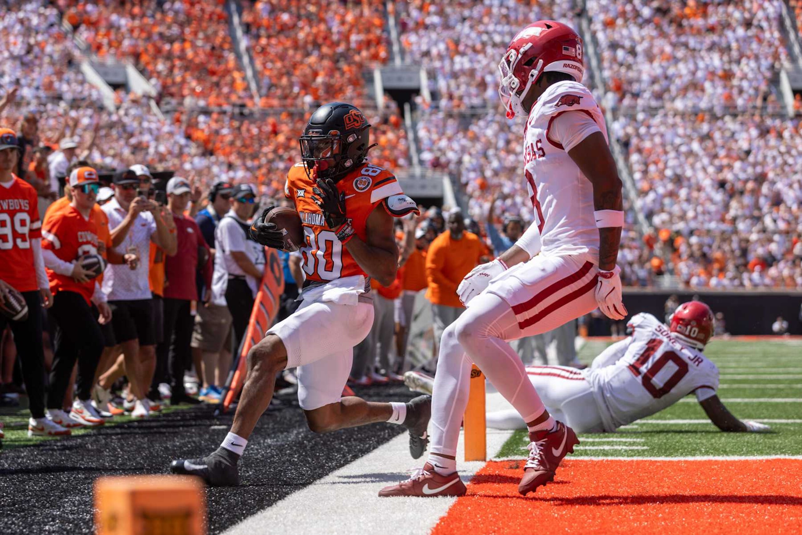 STILLWATER, OK - SEPTEMBER 07: Oklahoma State Cowboys wide receiver Brennan Presley (80) steps into the end zone for a touchdown against the Arkansas Razorbacks on September 7th, 2024 at Boone Pickens Stadium in Stillwater, Oklahoma. (Photo by WJ/Icon Sportswire via Getty Images)