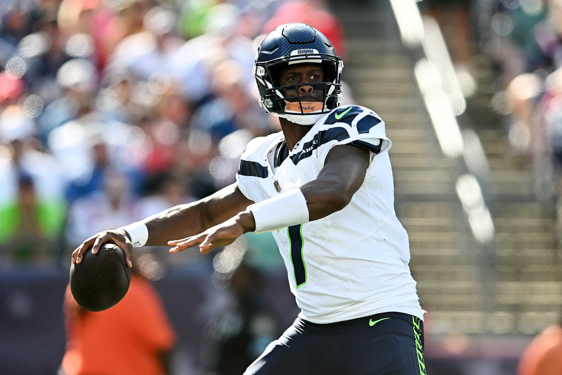 FOXBOROUGH, MA - SEPTEMBER 15: Geno Smith #7 of the Seattle Seahawks looks to throw the football during the game against the New England Patriots at Gillette Stadium on September 15, 2024 in Foxborough, Massachusetts. (Photo by Kathryn Riley/Getty Images)