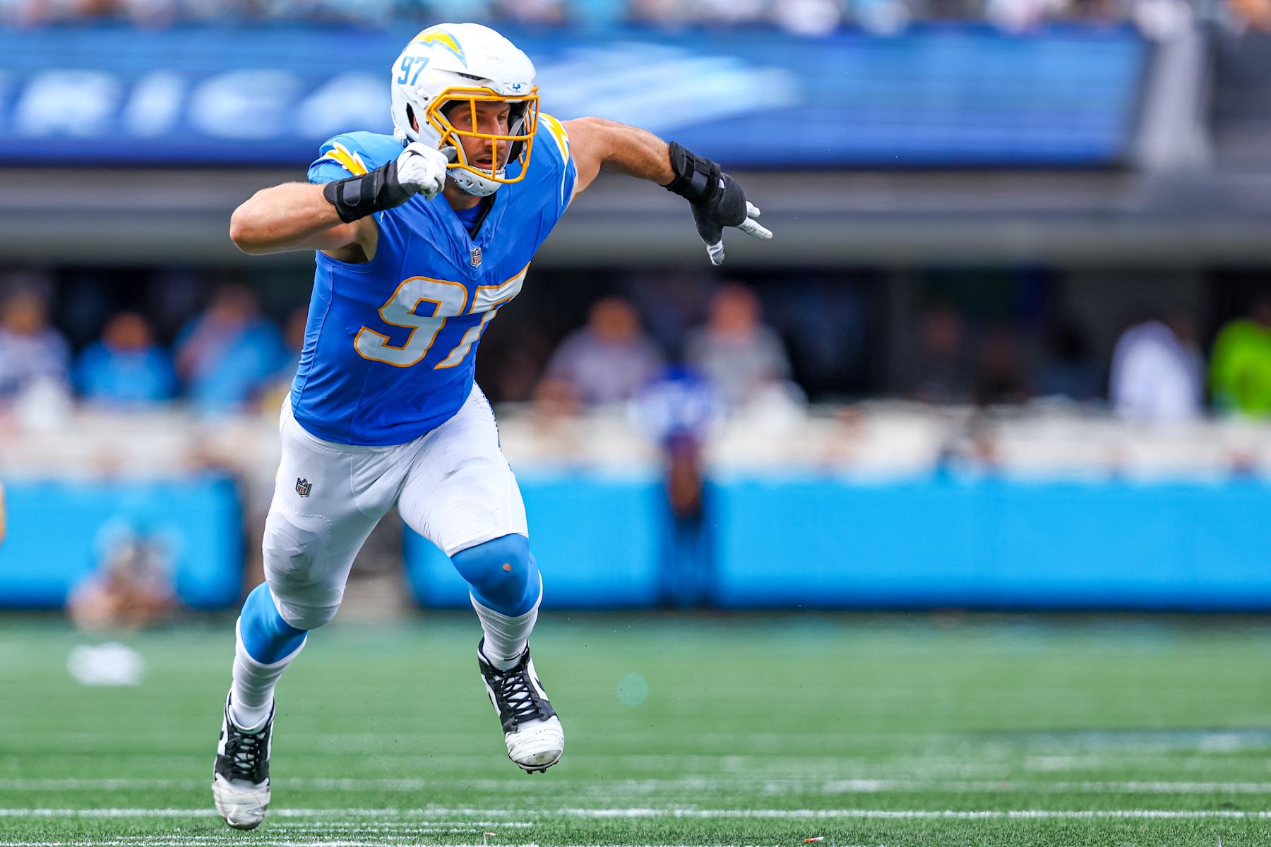 CHARLOTTE, NC - SEPTEMBER 15: Joey Bosa #97 of the Los Angeles Chargers rushes the backfield during a football game against the Carolina Panthers at Bank of America Stadium on September 15, 2024 in Charlotte, North Carolina. (Photo by David Jensen/Icon Sportswire via Getty Images)