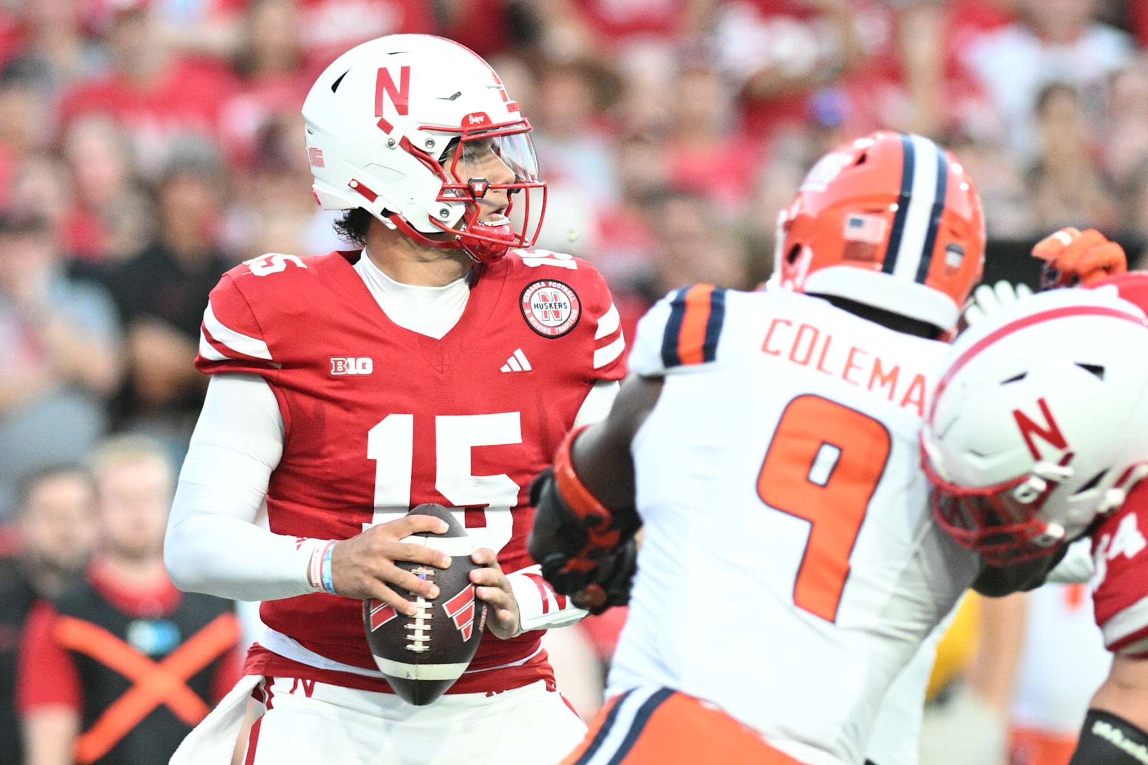 LINCOLN, NEBRASKA - SEPTEMBER 20: Dylan Raiola #15 of the Nebraska Cornhuskers drops back to pass against the Illinois Fighting Illini during the first quarter at Memorial Stadium on September 20, 2024 in Lincoln, Nebraska. (Photo by Steven Branscombe/Getty Images) LINCOLN, NEBRASKA - SEPTEMBER 20: Dylan Raiola #15 of the Nebraska Cornhuskers drops back to pass against the Illinois Fighting Illini during the first quarter at Memorial Stadium on September 20, 2024 in Lincoln, Nebraska. (Photo by Steven Branscombe/Getty Images)