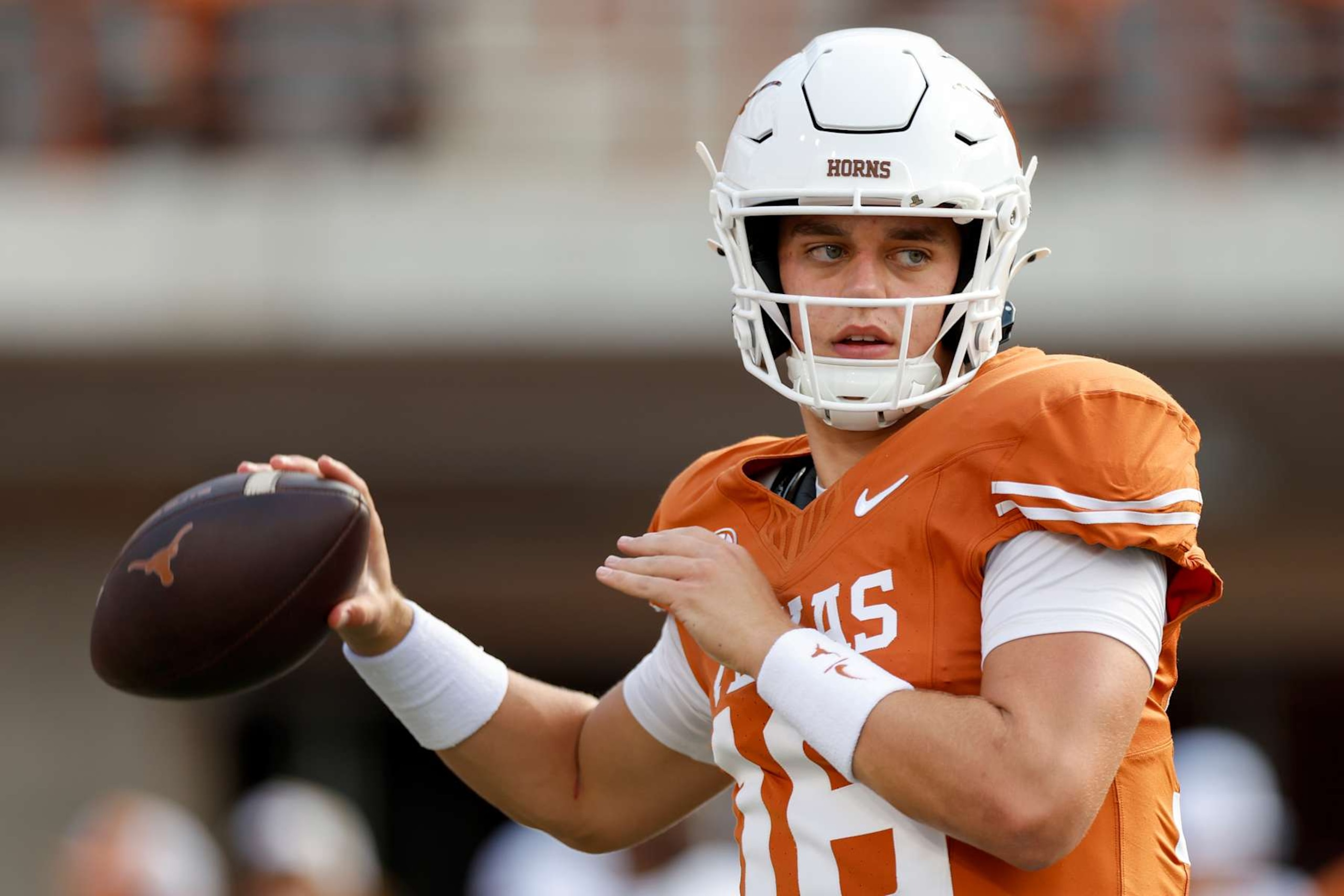 AUSTIN, TEXAS - SEPTEMBER 14: Arch Manning #16 of the Texas Longhorns warms up before the game against the UTSA Roadrunners at Darrell K Royal-Texas Memorial Stadium on September 14, 2024 in Austin, Texas. (Photo by Tim Warner/Getty Images)