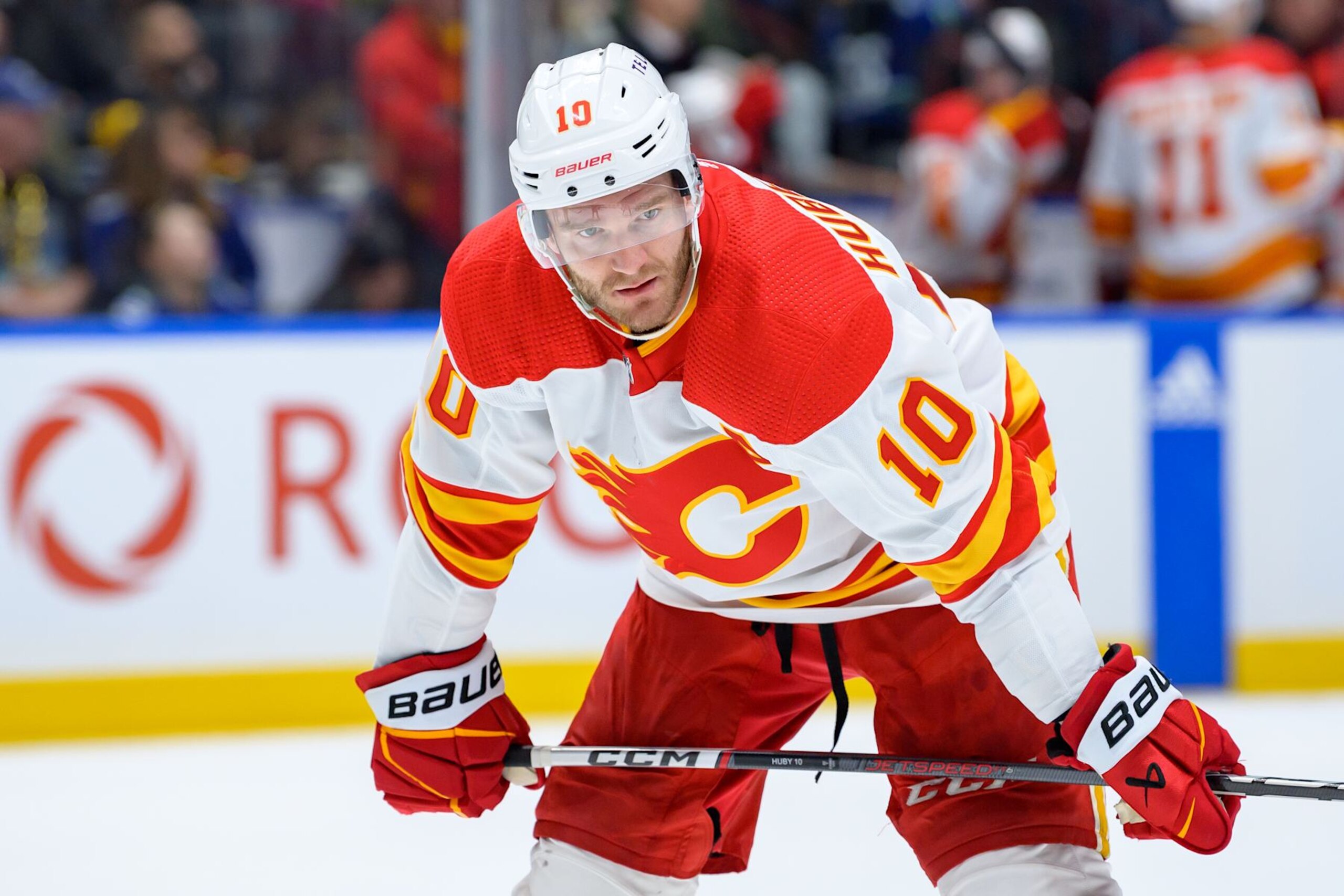 VANCOUVER, CANADA - APRIL 16: Jonathan Huberdeau #10 of the Calgary Flames waits for a face-off during the second period of their NHL game against the Vancouver Canucks at Rogers Arena on April 16, 2024 in Vancouver, British Columbia, Canada. (Photo by Derek Cain/Getty Images)