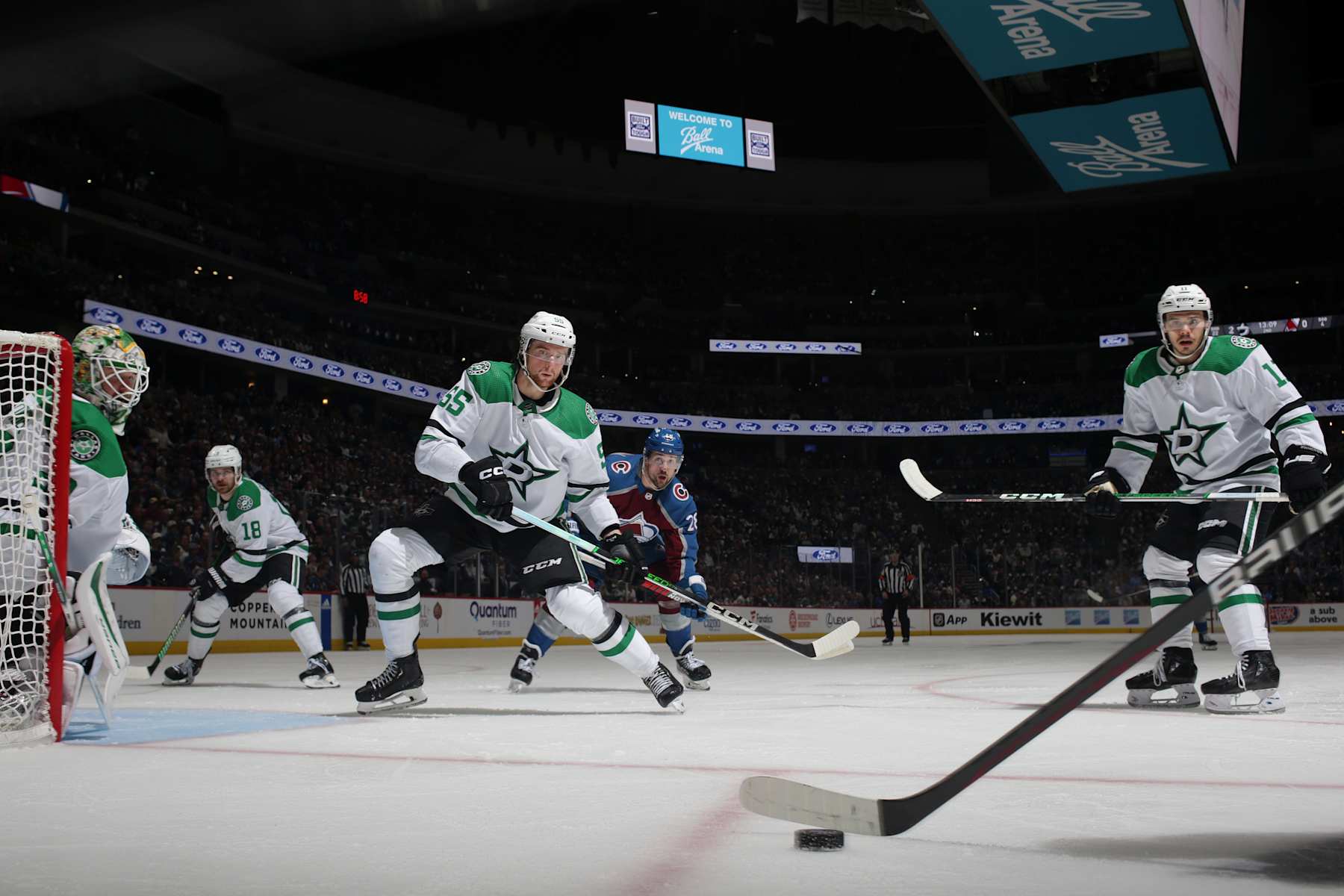 DENVER, COLORADO - MAY 13: Thomas Harley #55 and Logan Stankoven #11 of the Dallas Stars defend against the Colorado Avalanche in Game Four of the Second Round of the 2024 Stanley Cup Playoffs at Ball Arena on May 13, 2024 in Denver, Colorado. (Photo by Michael Martin/NHLI via Getty Images)