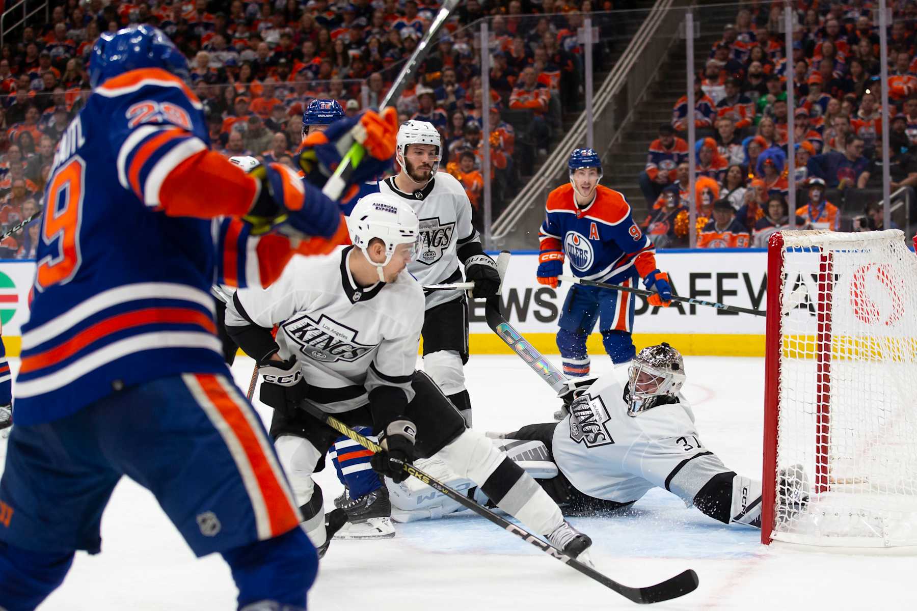 EDMONTON, CANADA - MAY 1: Leon Draisaitl #29 of the Edmonton Oilers scores against goaltender David Rittich #31 of the Los Angeles Kings during the second period in Game Five of the First Round of the 2024 Stanley Cup Playoffs at Rogers Place on May 1, 2024, in Edmonton, Canada.  (Photo by Codie McLachlan/Getty Images)