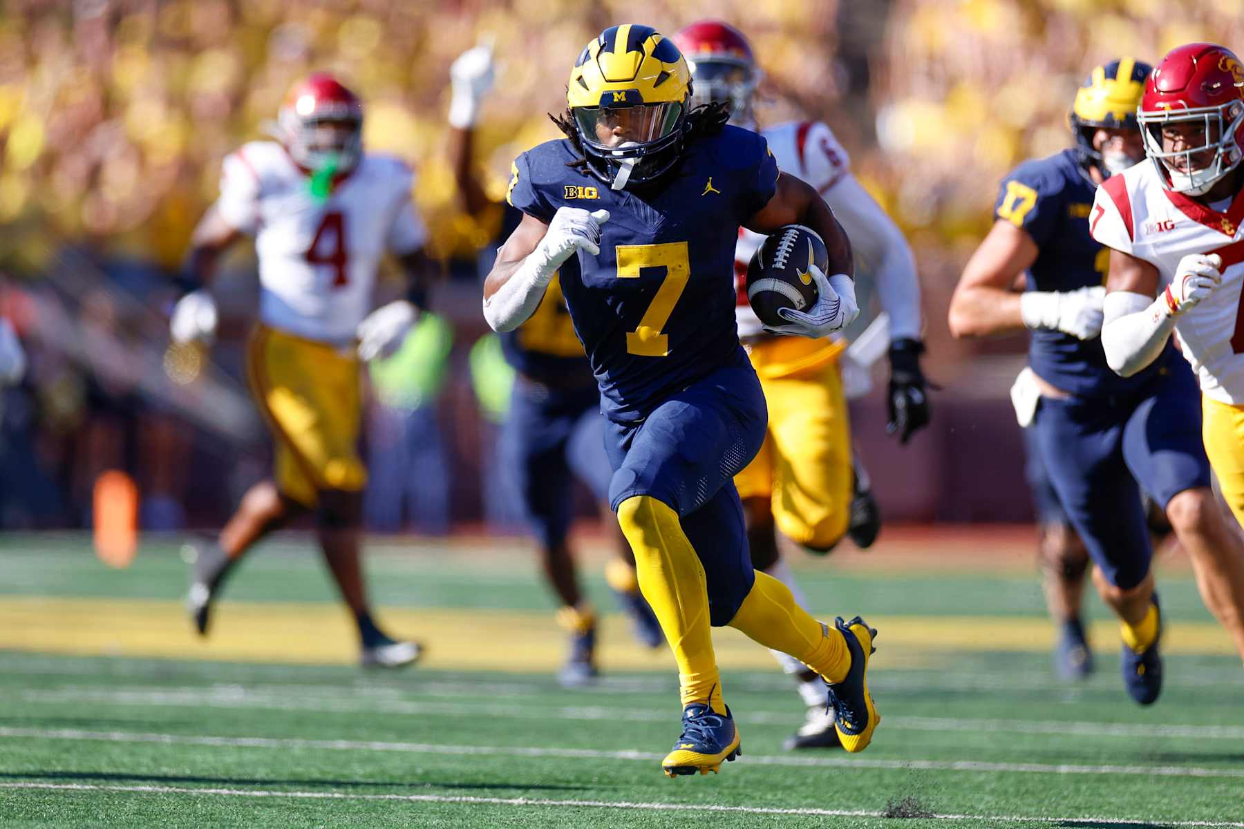 ANN ARBOR, MICHIGAN - SEPTEMBER 21: Donovan Edwards #7 of the Michigan Wolverines runs with the ball for a touchdown in the second quarter during a game against the USC Trojans at Michigan Stadium on September 21, 2024 in Ann Arbor, Michigan. (Photo by Brandon Sloter/Getty Images)