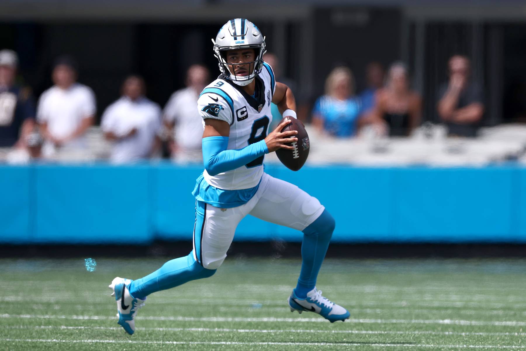 CHARLOTTE, NORTH CAROLINA - SEPTEMBER 15: Quarterback Bryce Young #9 of the Carolina Panthers scrambles from the pocket during the first half of the game at Bank of America Stadium on September 15, 2024 in Charlotte, North Carolina. (Photo by Jared C. Tilton/Getty Images)