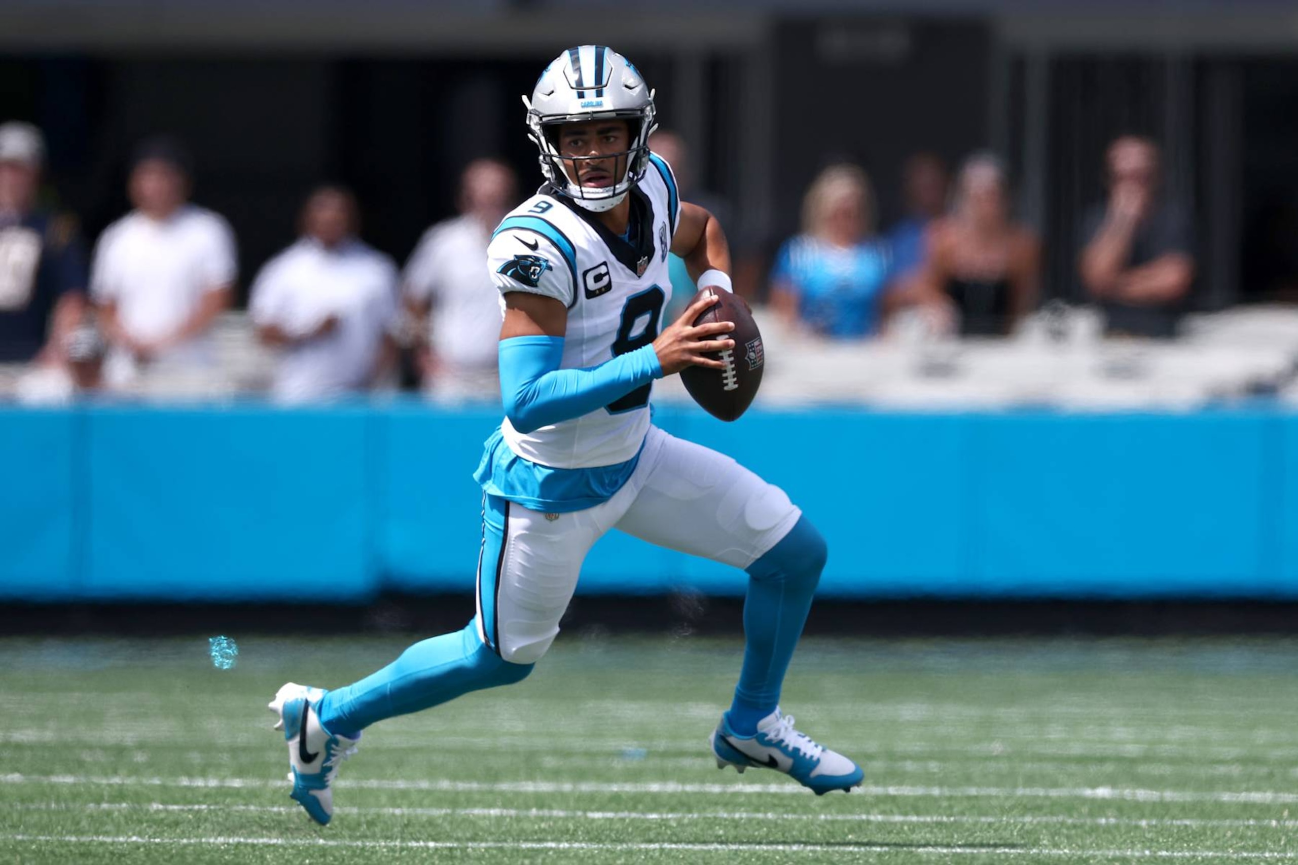 CHARLOTTE, NORTH CAROLINA - SEPTEMBER 15: Quarterback Bryce Young #9 of the Carolina Panthers scrambles from the pocket during the first half of the game at Bank of America Stadium on September 15, 2024 in Charlotte, North Carolina. (Photo by Jared C. Tilton/Getty Images)