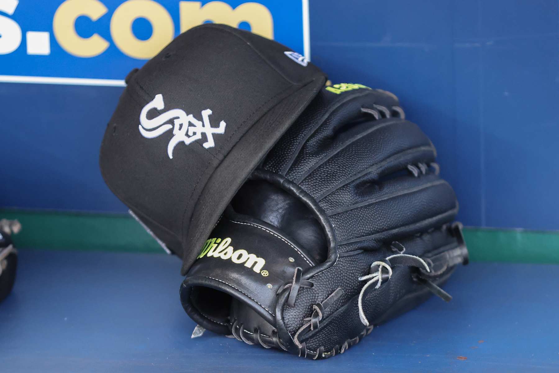 KANSAS CITY, MO - JULY 20: A view of a Chicago White Sox ball cap and glove before an MLB game between the Chicago White Sox and Kansas City Royals on July 20, 2024 at Kauffman Stadium in Kansas City,  MO. (Photo by Scott Winters/Icon Sportswire via Getty Images)