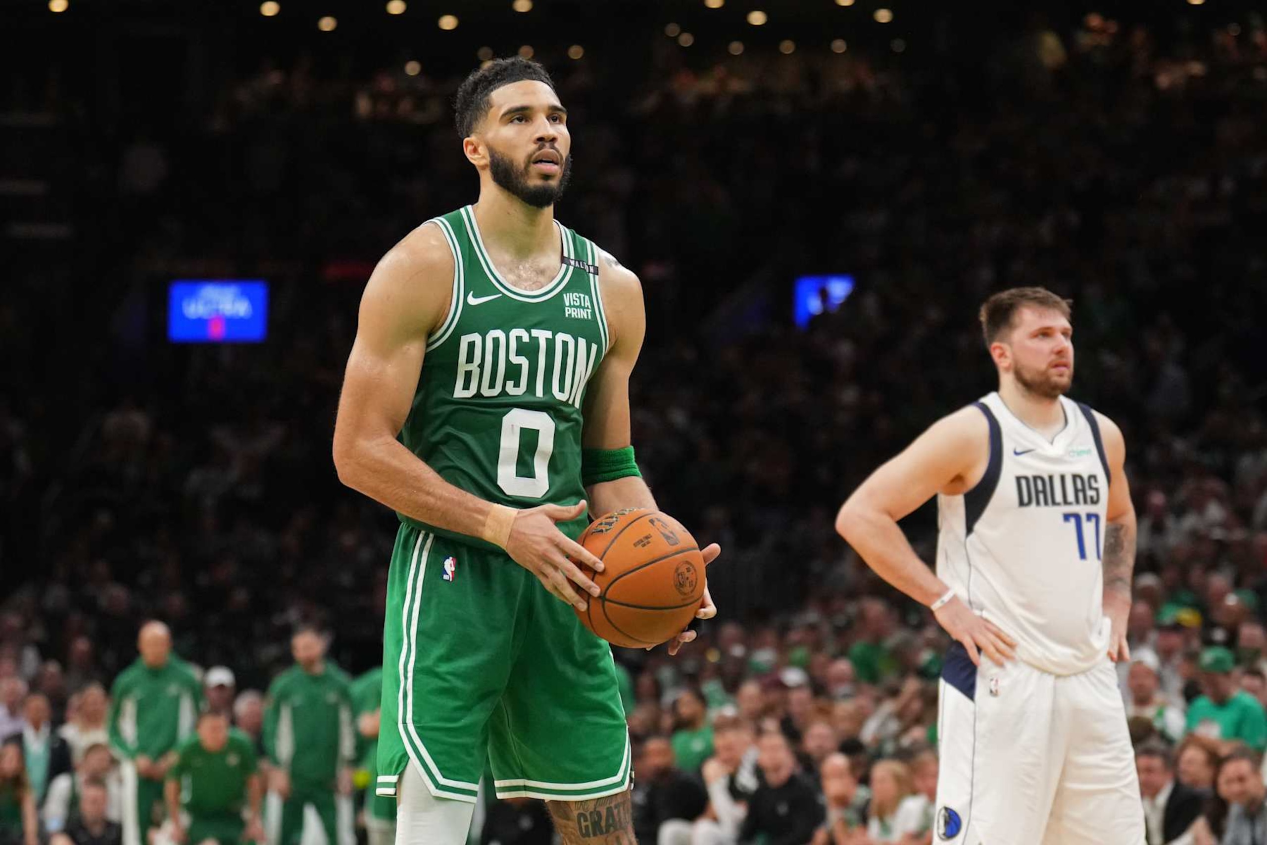 BOSTON, MA - JUNE 17: Jayson Tatum #0 of the Boston Celtics prepares to shoot a free throw against the Dallas Mavericks during Game 5 of the 2024 NBA Finals on June 17, 2024 at the TD Garden in Boston, Massachusetts. NOTE TO USER: User expressly acknowledges and agrees that, by downloading and or using this photograph, User is consenting to the terms and conditions of the Getty Images License Agreement. Mandatory Copyright Notice: Copyright 2024 NBAE  (Photo by Jesse D. Garrabrant/NBAE via Getty Images)