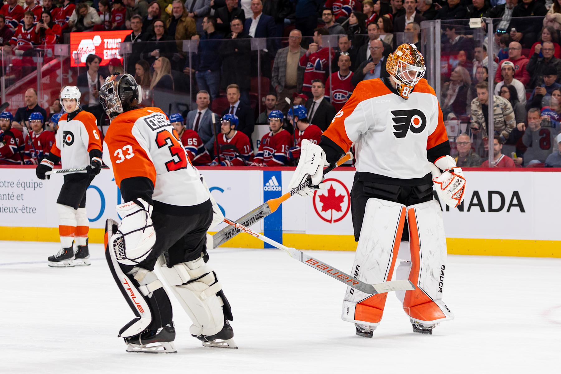 MONTREAL, CANADA - APRIL 9: Ivan Fedotov #82 of the Philadelphia Flyers replaces teammate Samuel Ersson #33 in the net during the second period of the NHL regular season game against the Montreal Canadiens at the Bell Centre on April 9, 2024 in Montreal, Quebec, Canada. The Montreal Canadiens defeated the Philadelphia Flyers by a score of 9-3. (Photo by Vitor Munhoz/NHLI via Getty Images)