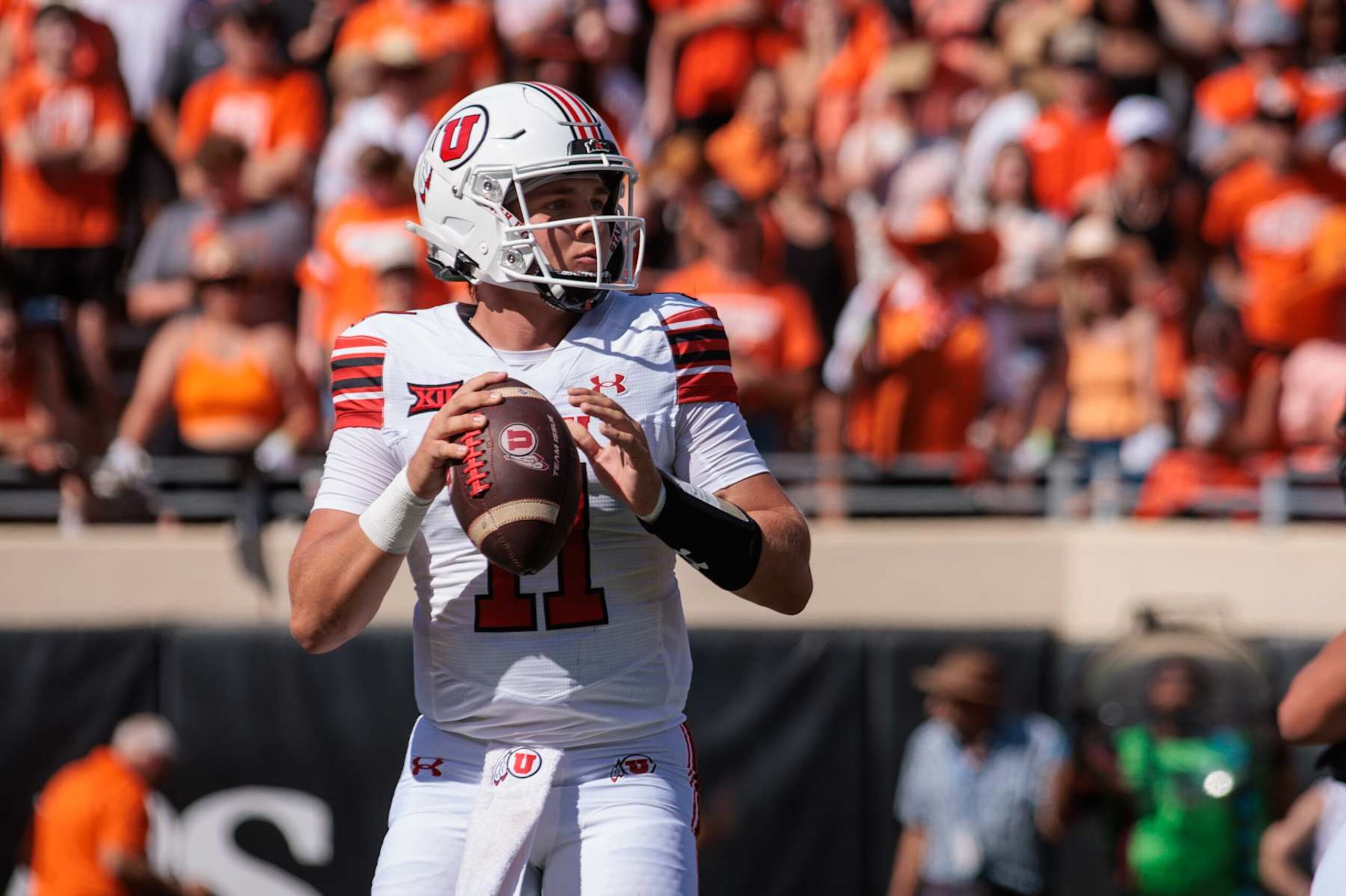STILLWATER, OK - SEPTEMBER 21: Utah Utes quarterback Isaac Wilson (11) looks to pass against the Oklahoma State Cowboys on September 21st, 2024 at Boone Pickens Stadium in Stillwater, Oklahoma. (Photo by WJ/Icon Sportswire via Getty Images)