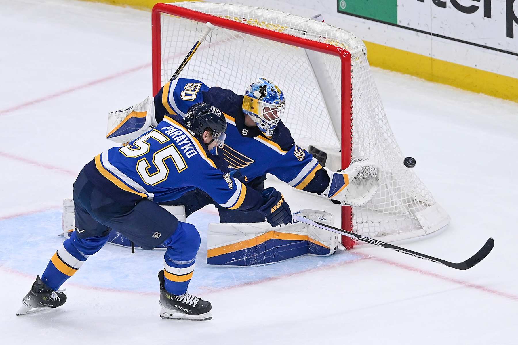 ST. LOUIS, MO - APRIL 1: Jordan Binnington #50 and Colton Parayko #55 of the St. Louis Blues defend the net against the Edmonton Oilers on April 1, 2024 at the Enterprise Center in St. Louis, Missouri. (Photo by Alexis R. Knight/NHLI via Getty Images)