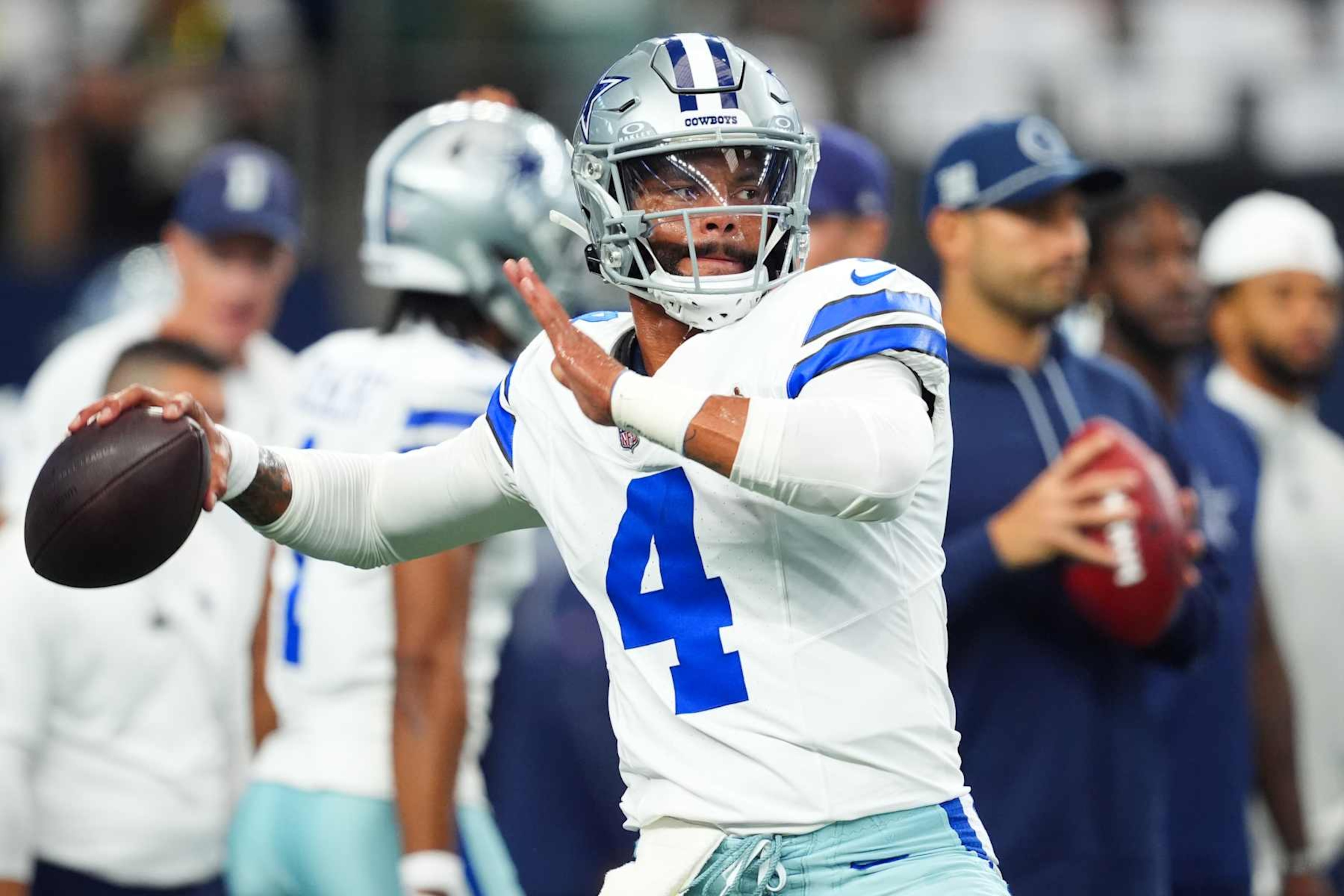 ARLINGTON, TEXAS - SEPTEMBER 22: Quarterback Dak Prescott #4 of the Dallas Cowboys warms up before a game against the Baltimore Ravens at AT&T Stadium on September 22, 2024 in Arlington, Texas. (Photo by Sam Hodde/Getty Images) ARLINGTON, TEXAS - SEPTEMBER 22: Quarterback Dak Prescott #4 of the Dallas Cowboys warms up before a game against the Baltimore Ravens at AT&T Stadium on September 22, 2024 in Arlington, Texas. (Photo by Sam Hodde/Getty Images)