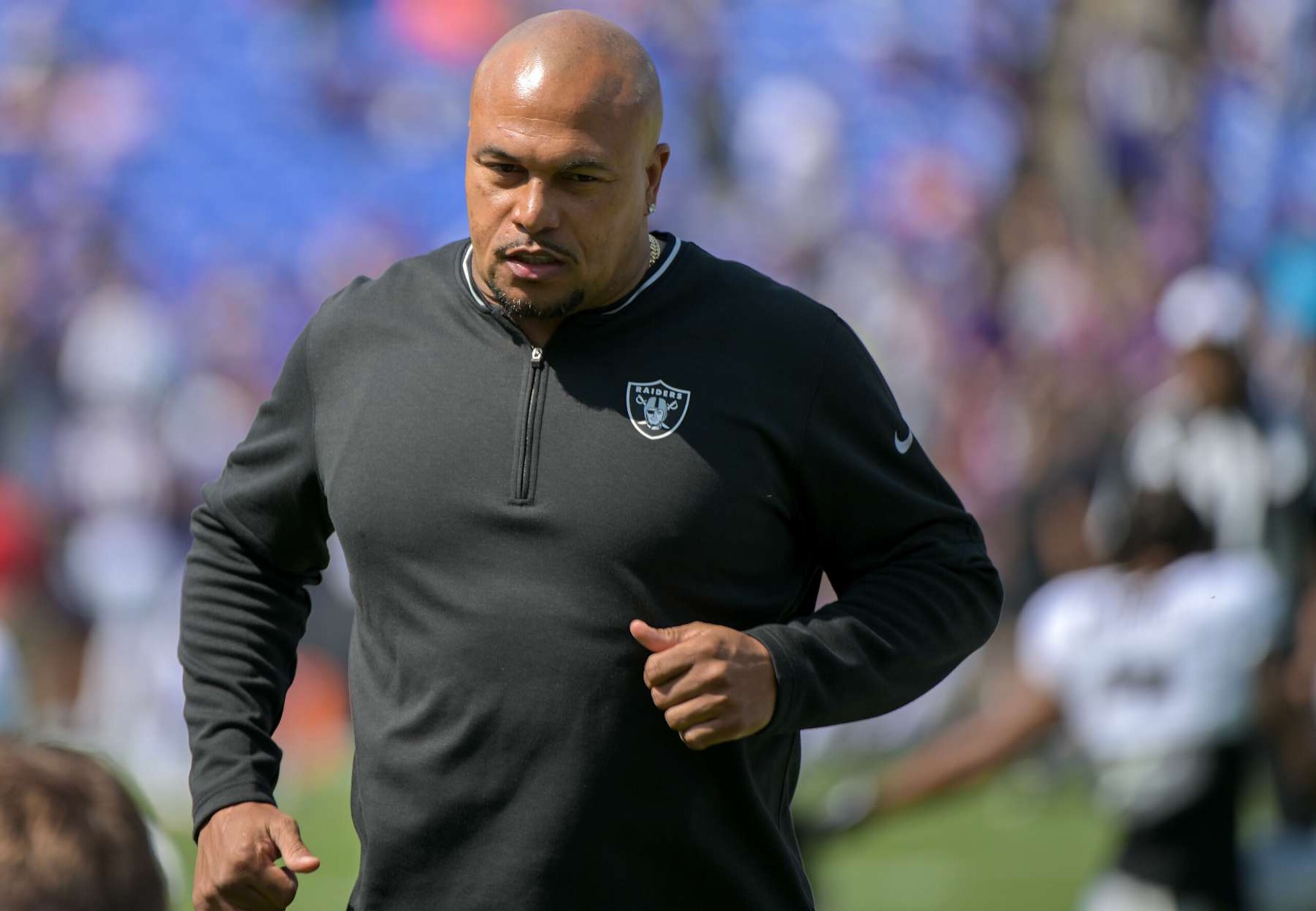 BALTIMORE, MD - SEPTEMBER 15: Las Vegas Raiders head coach Antonio Pierce walks on the field prior to the NFL game between the Las Vegas Raiders and the Baltimore Ravens on September 15, 2024 at M&T Bank Stadium in Baltimore, MD. (Photo by Mark Goldman/Icon Sportswire via Getty Images)