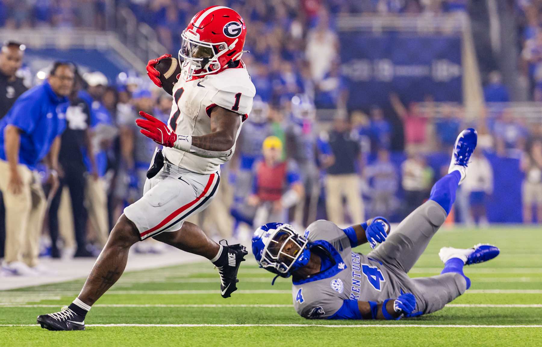 LEXINGTON, KENTUCKY - SEPTEMBER 14: Trevor Etienne #1 of the Georgia Bulldogs runs the ball during the game against the Kentucky Wildcats at Kroger Field on September 14, 2024 in Lexington, Kentucky. (Photo by Michael Hickey/Getty Images)