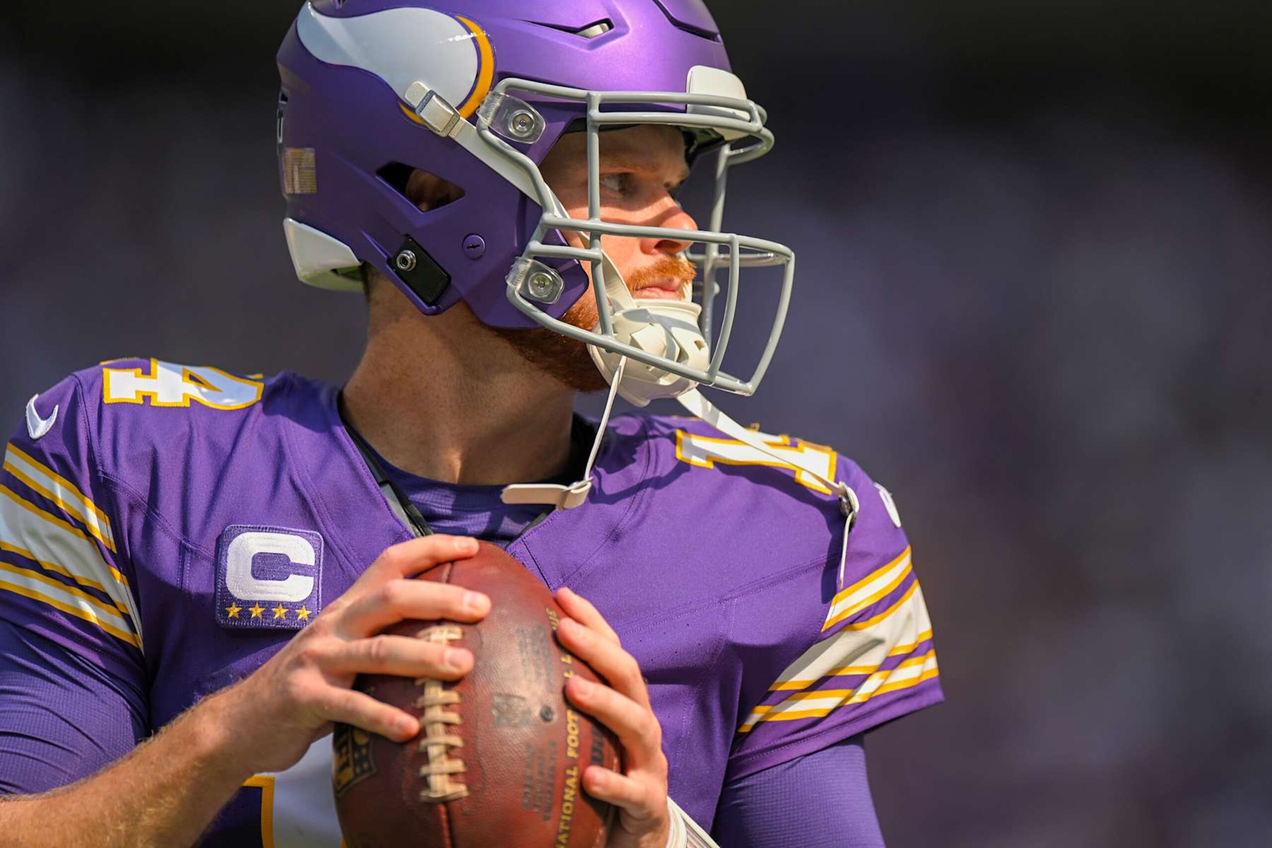 MINNEAPOLIS, MN - SEPTEMBER 22:  Minnesota Vikings quarterback Sam Darnold (14) warms up before an NFL game between the Minnesota Vikings and Houston Texans on September 22, 2024, at U.S. Bank Stadium in Minneapolis, MN. (Photo by Nick Wosika/Icon Sportswire via Getty Images)