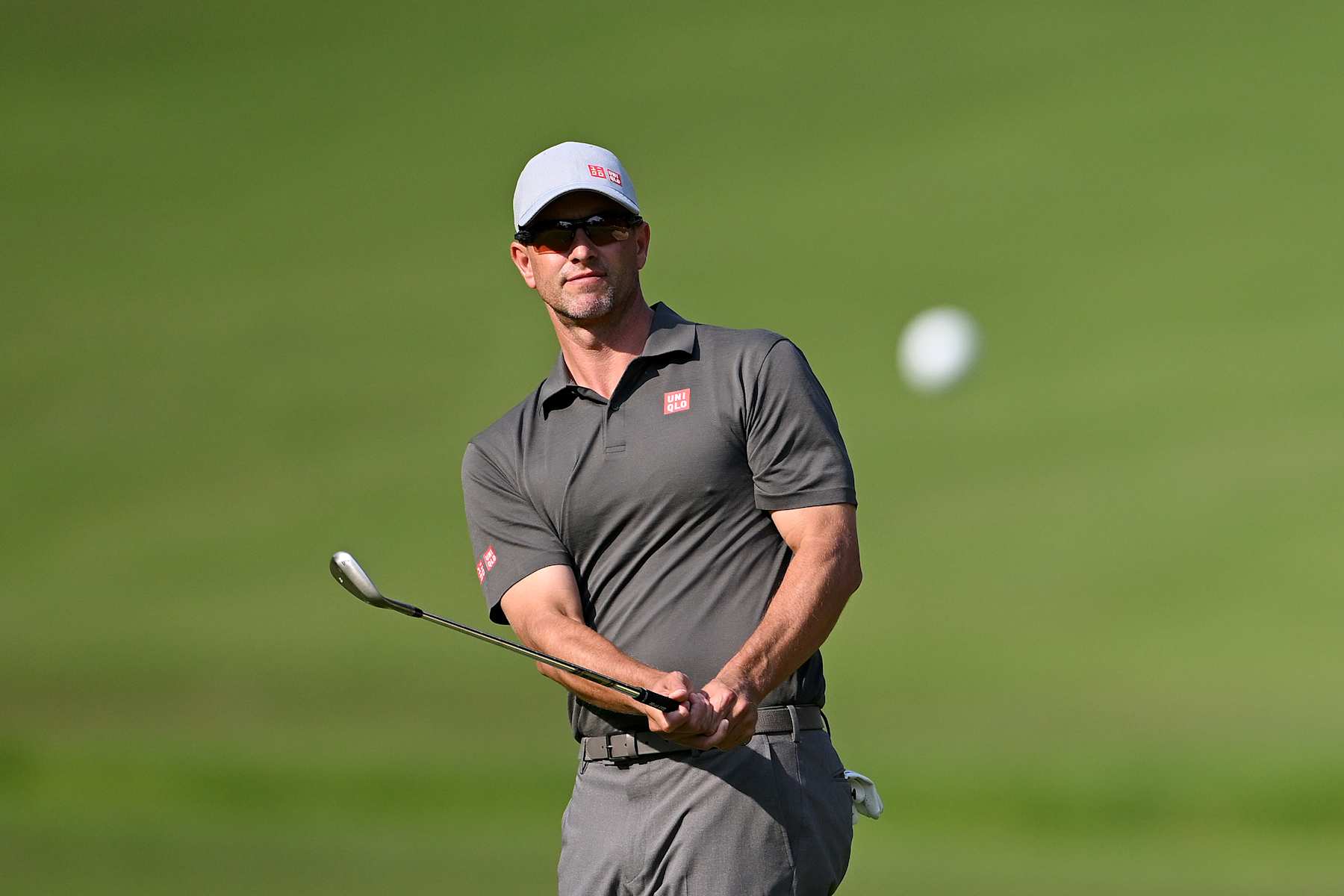 VIRGINIA WATER, ENGLAND - SEPTEMBER 20: Adam Scott of Australia plays his third shot on the fourth hole during day two of the BMW PGA Championship 2024 at Wentworth Club on September 20, 2024 in Virginia Water, England. (Photo by Ross Kinnaird/Getty Images)