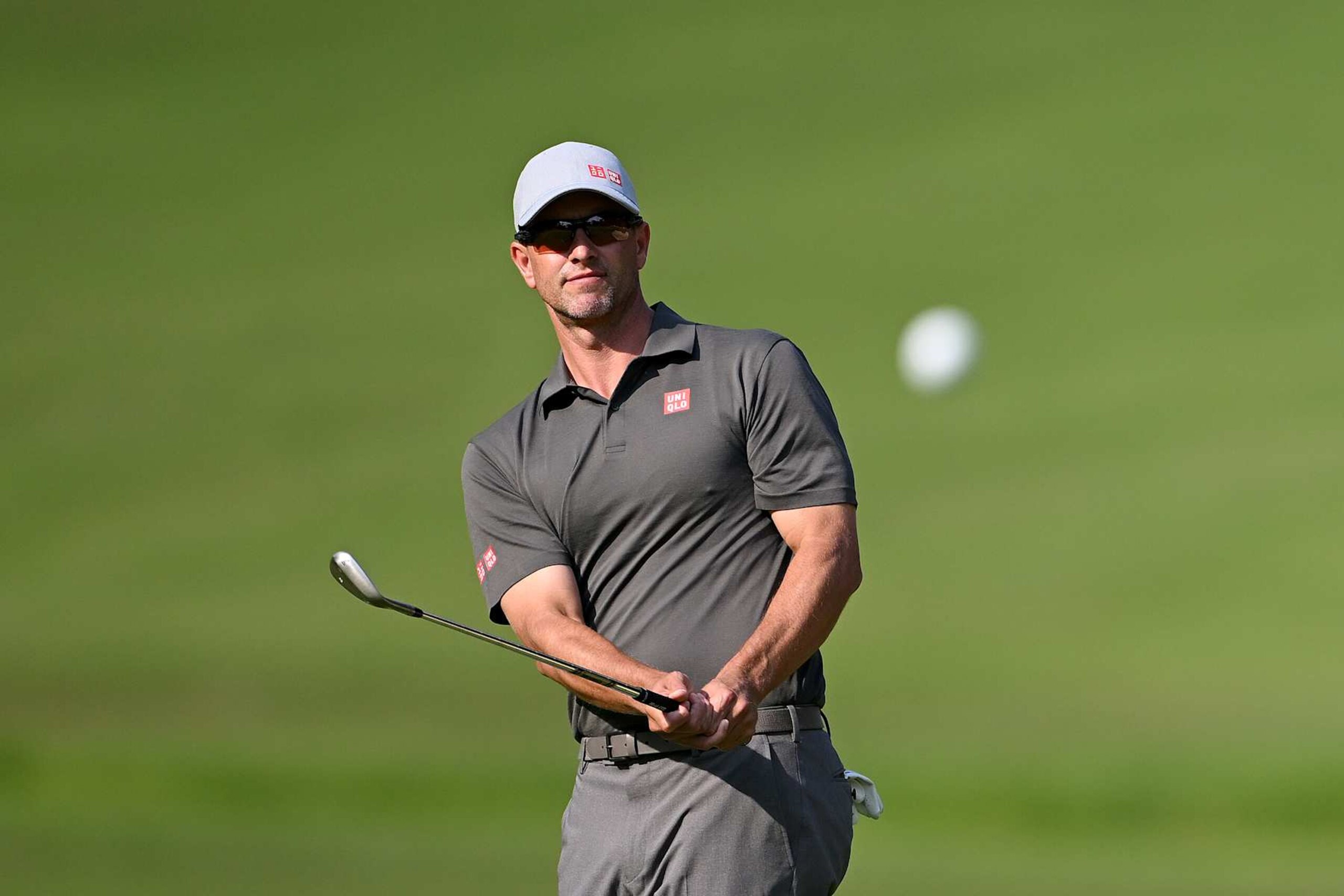 VIRGINIA WATER, ENGLAND - SEPTEMBER 20: Adam Scott of Australia plays his third shot on the fourth hole during day two of the BMW PGA Championship 2024 at Wentworth Club on September 20, 2024 in Virginia Water, England. (Photo by Ross Kinnaird/Getty Images)