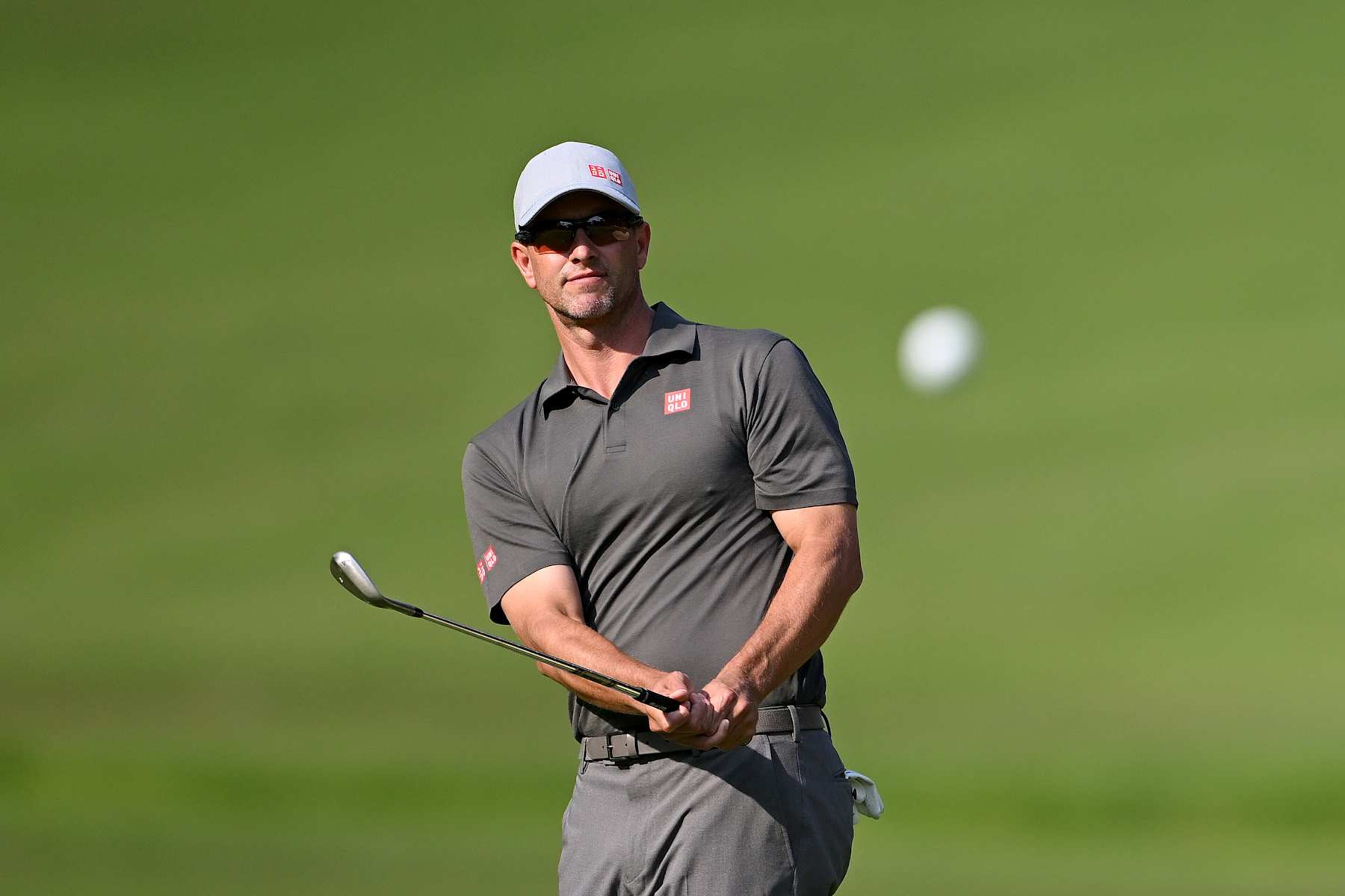 VIRGINIA WATER, ENGLAND - SEPTEMBER 20: Adam Scott of Australia plays his third shot on the fourth hole during day two of the BMW PGA Championship 2024 at Wentworth Club on September 20, 2024 in Virginia Water, England. (Photo by Ross Kinnaird/Getty Images)