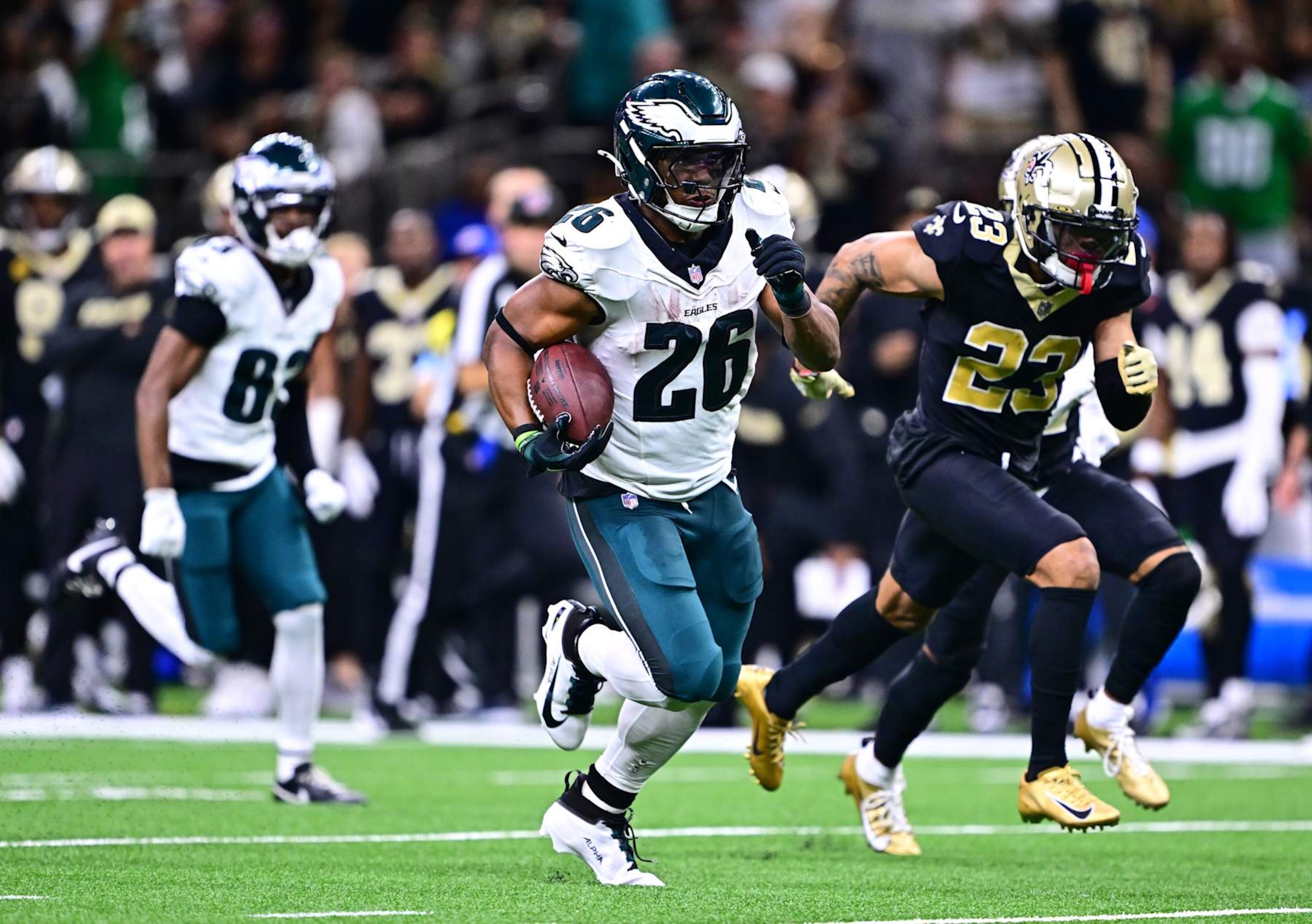 NEW ORLEANS, LOUISIANA - SEPTEMBER 22: Saquon Barkley #26 of the Philadelphia Eagles runs for a touchdown against the New Orleans Saints during the fourth quarter at Caesars Superdome on September 22, 2024 in New Orleans, Louisiana. (Photo by Gus Stark/Getty Images)