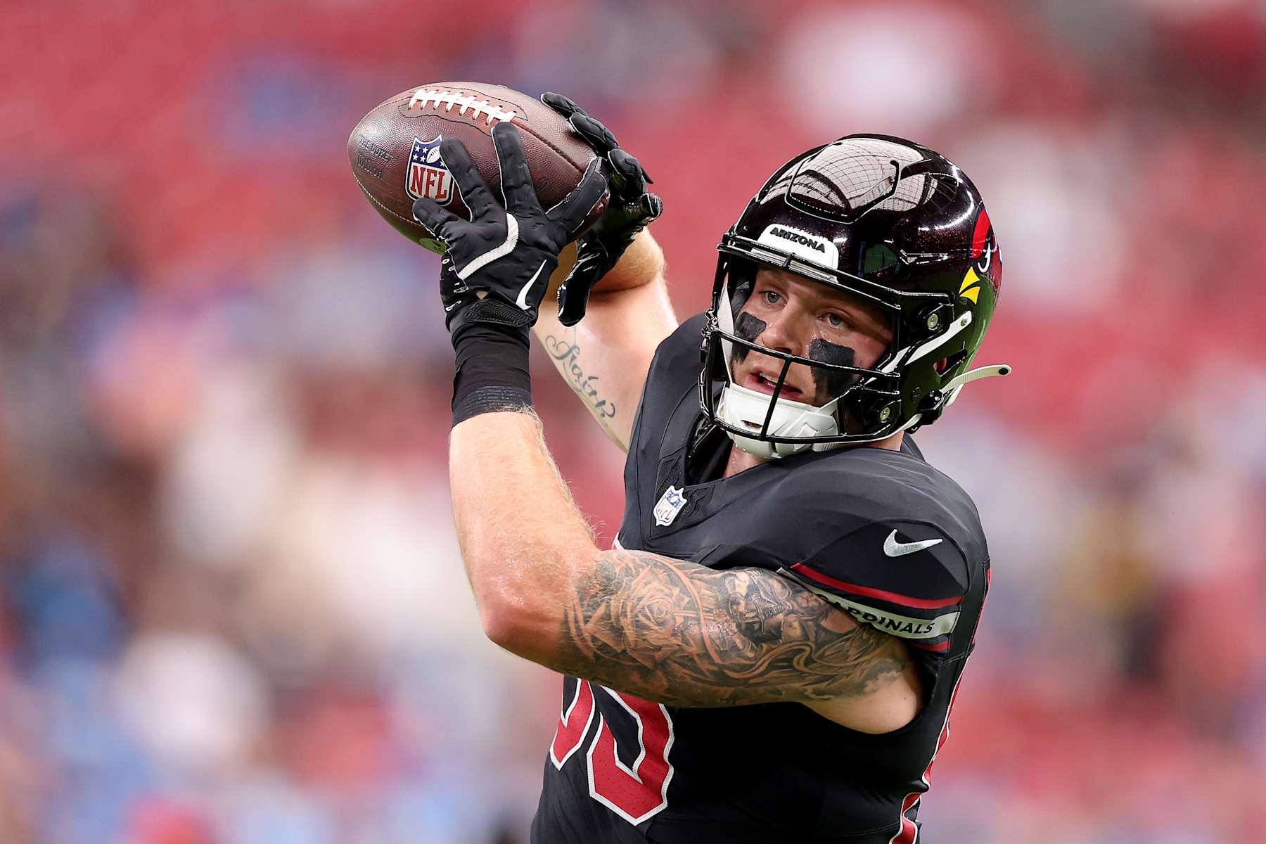 GLENDALE, ARIZONA - SEPTEMBER 22: Trey McBride #85 of the Arizona Cardinals warms up prior to the game against the Detroit Lions at State Farm Stadium on September 22, 2024 in Glendale, Arizona. (Photo by Christian Petersen/Getty Images)