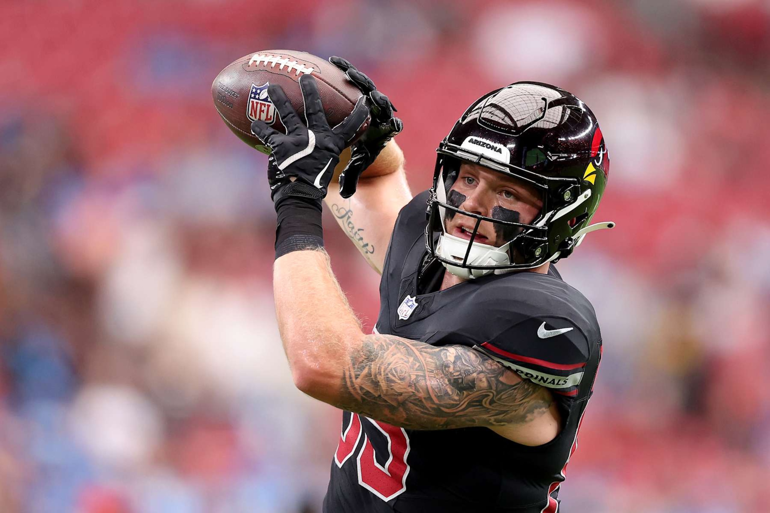 GLENDALE, ARIZONA - SEPTEMBER 22: Trey McBride #85 of the Arizona Cardinals warms up prior to the game against the Detroit Lions at State Farm Stadium on September 22, 2024 in Glendale, Arizona. (Photo by Christian Petersen/Getty Images)