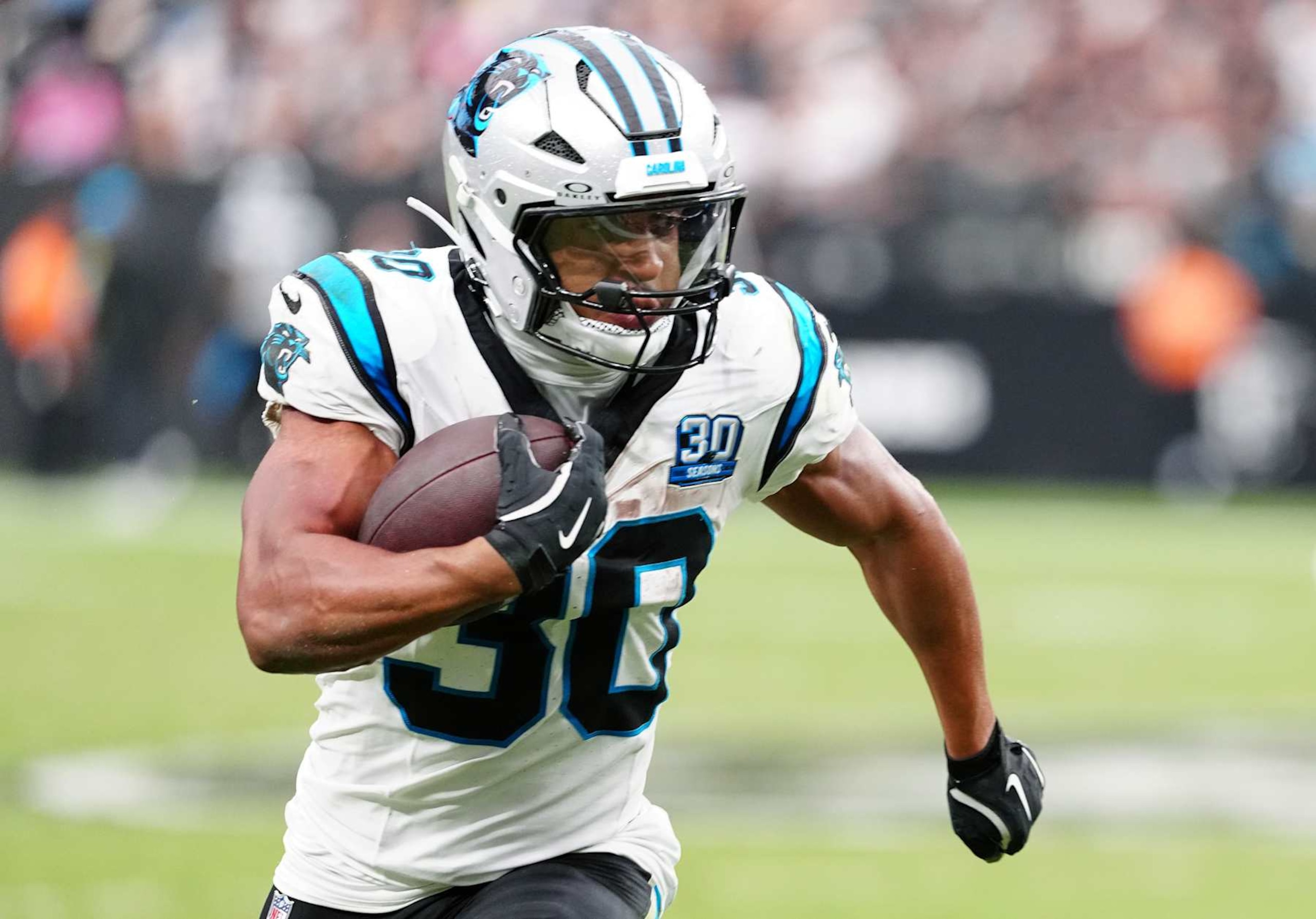 LAS VEGAS, NEVADA - SEPTEMBER 22: Chuba Hubbard #30 of the Carolina Panthers runs with the ball during the third quarter against the Las Vegas Raiders at Allegiant Stadium on September 22, 2024 in Las Vegas, Nevada. (Photo by Louis Grasse/Getty Images)