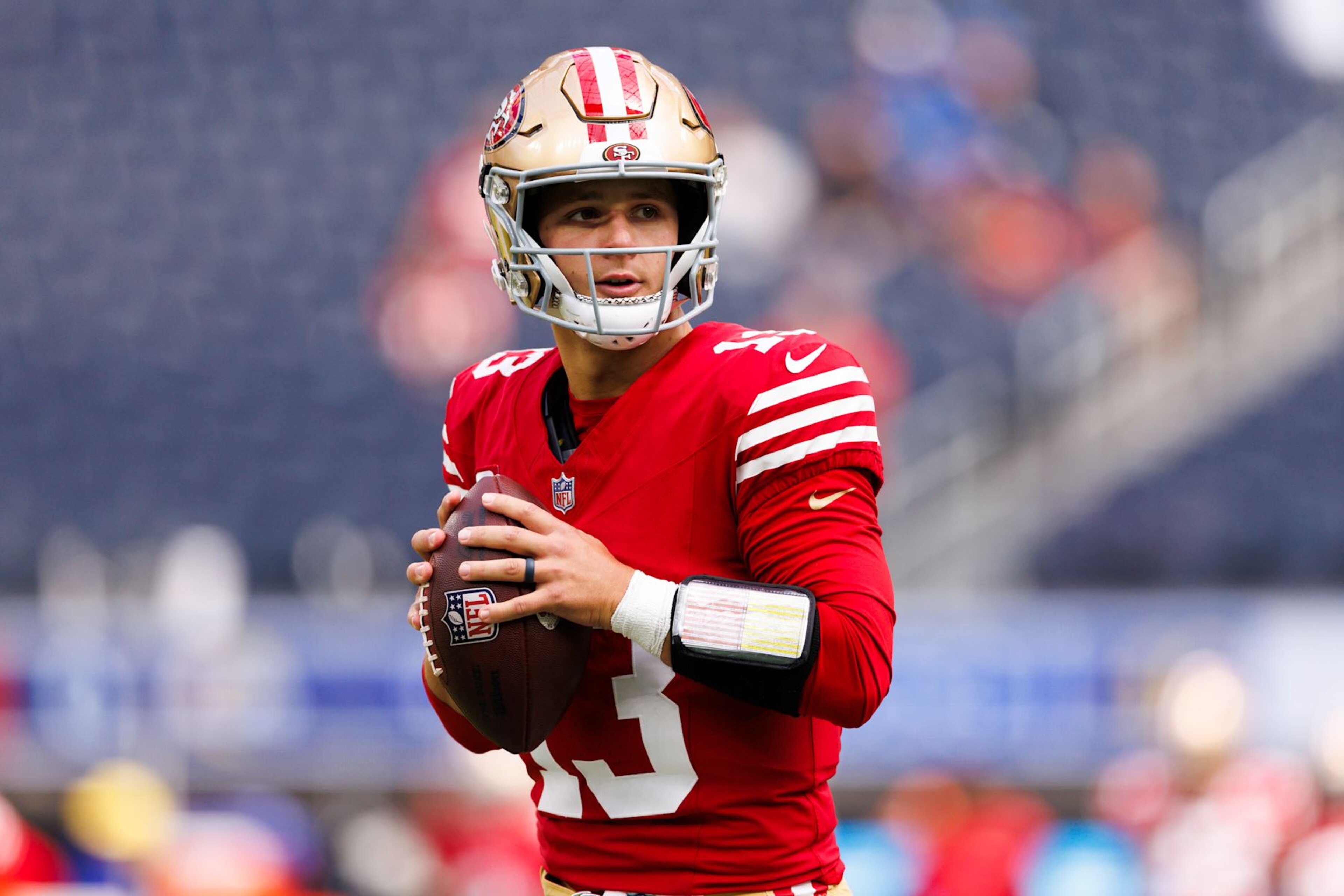 INGLEWOOD, CALIFORNIA - SEPTEMBER 22: Brock Purdy #13 of the San Francisco 49ers drops back to pass during warm-up before a game against the Los Angeles Rams at SoFi Stadium on September 22, 2024 in Inglewood, California. (Photo by Ric Tapia/Getty Images) INGLEWOOD, CALIFORNIA - SEPTEMBER 22: Brock Purdy #13 of the San Francisco 49ers drops back to pass during warm-up before a game against the Los Angeles Rams at SoFi Stadium on September 22, 2024 in Inglewood, California. (Photo by Ric Tapia/Getty Images)