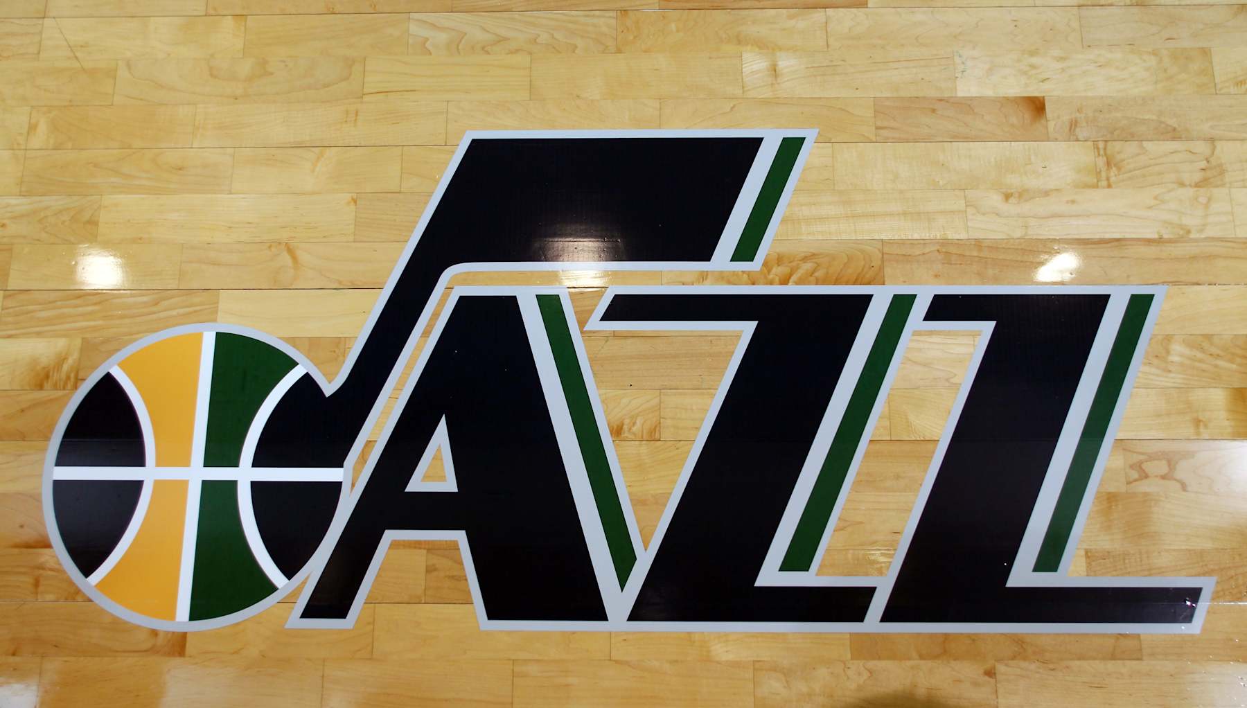 SALT LAKE CITY, UT - JUNE 15:  An additional Utah Jazz logo unveiled at EnergySolutions Arena on June 15, 2010 in Salt Lake City, Utah. NOTE TO USER: User expressly acknowledges and agrees that, by downloading and or using this Photograph, User is consenting to the terms and conditions of the Getty Images License Agreement. Mandatory Copyright Notice: Copyright 2010 NBAE (Photo by Steve C. Wilson/NBAE via Getty Images)