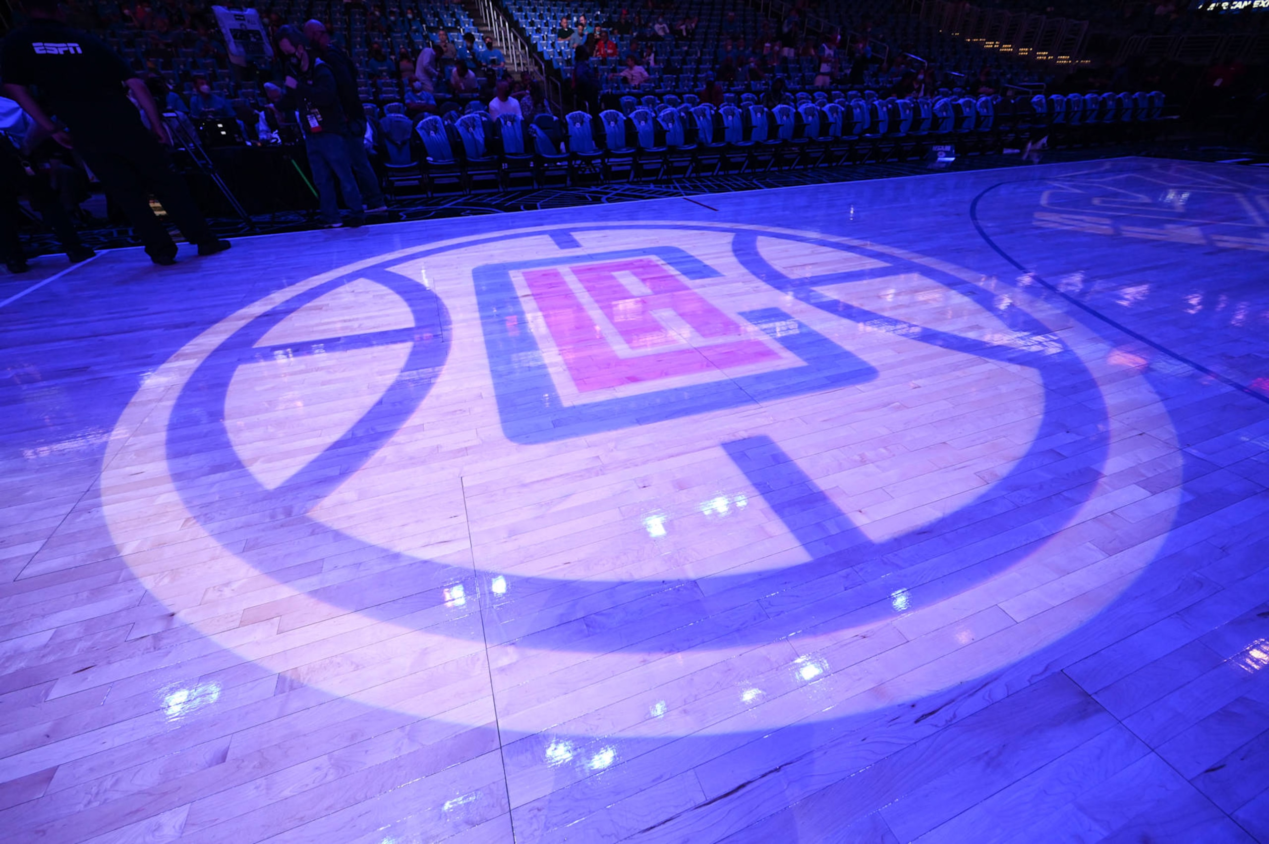 LOS ANGELES, CA - JUNE 18: The LA Clippers logo on the court during the game against the Utah Jazz during Round 2, Game 6 of the 2021 NBA Playoffs on June 18, 2021 at STAPLES Center in Los Angeles, California. NOTE TO USER: User expressly acknowledges and agrees that, by downloading and/or using this Photograph, user is consenting to the terms and conditions of the Getty Images License Agreement. Mandatory Copyright Notice: Copyright 2021 NBAE (Photo by Adam Pantozzi/NBAE via Getty Images) LOS ANGELES, CA - JUNE 18: The LA Clippers logo on the court during the game against the Utah Jazz during Round 2, Game 6 of the 2021 NBA Playoffs on June 18, 2021 at STAPLES Center in Los Angeles, California. NOTE TO USER: User expressly acknowledges and agrees that, by downloading and/or using this Photograph, user is consenting to the terms and conditions of the Getty Images License Agreement. Mandatory Copyright Notice: Copyright 2021 NBAE (Photo by Adam Pantozzi/NBAE via Getty Images)