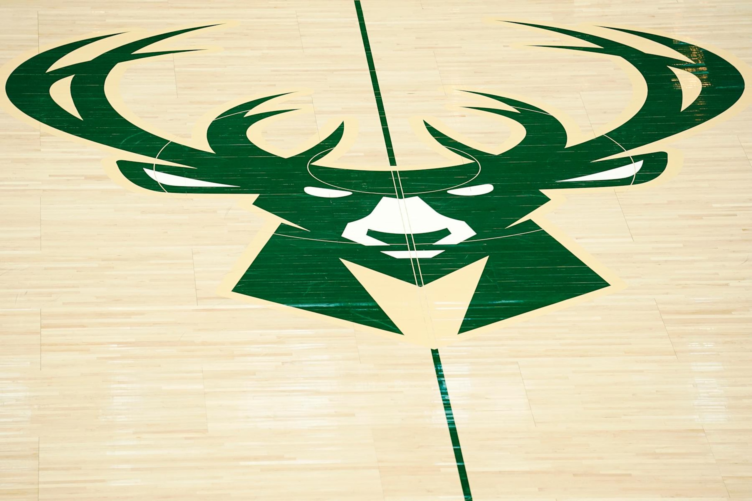 MILWAUKEE, WISCONSIN - MARCH 06: A general view of the Milwaukee Bucks logo at center court before a game against the Phoenix Suns at Fiserv Forum on March 06, 2022 in Milwaukee, Wisconsin. NOTE TO USER: User expressly acknowledges and agrees that, by downloading and or using this photograph, User is consenting to the terms and conditions of the Getty Images License Agreement. (Photo by Patrick McDermott/Getty Images) MILWAUKEE, WISCONSIN - MARCH 06: A general view of the Milwaukee Bucks logo at center court before a game against the Phoenix Suns at Fiserv Forum on March 06, 2022 in Milwaukee, Wisconsin. NOTE TO USER: User expressly acknowledges and agrees that, by downloading and or using this photograph, User is consenting to the terms and conditions of the Getty Images License Agreement. (Photo by Patrick McDermott/Getty Images)