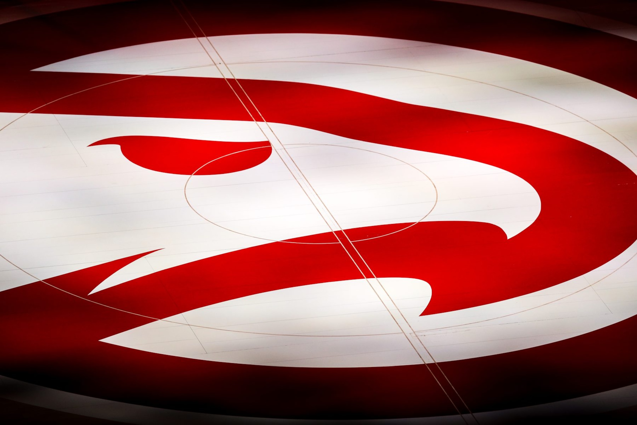 ATLANTA, GA - MAY 10: The Atlanta Hawks logo is seen on the court before the start of a game between the Washington Wizards and the Atlanta Hawks at State Farm Arena on May 10, 2021 in Atlanta, Georgia. NOTE TO USER: User expressly acknowledges and agrees that, by downloading and or using this photograph, User is consenting to the terms and conditions of the Getty Images License Agreement. (Photo by Casey Sykes/Getty Images) ATLANTA, GA - MAY 10: The Atlanta Hawks logo is seen on the court before the start of a game between the Washington Wizards and the Atlanta Hawks at State Farm Arena on May 10, 2021 in Atlanta, Georgia. NOTE TO USER: User expressly acknowledges and agrees that, by downloading and or using this photograph, User is consenting to the terms and conditions of the Getty Images License Agreement. (Photo by Casey Sykes/Getty Images)