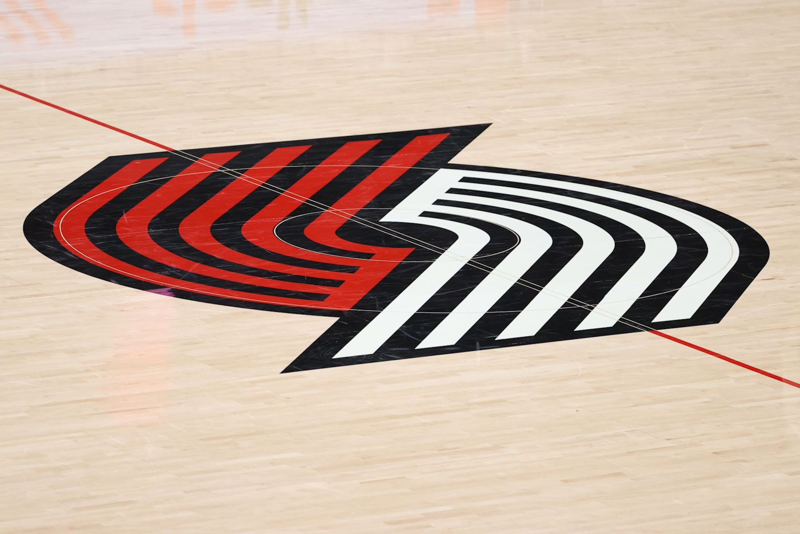PORTLAND, OREGON - JANUARY 16: A general view of the Portland Trail Blazers logo at Moda Center on January 16, 2021 in Portland, Oregon. NOTE TO USER: User expressly acknowledges and agrees that, by downloading and or using this photograph, User is consenting to the terms and conditions of the Getty Images License Agreement. (Photo by Abbie Parr/Getty Images) PORTLAND, OREGON - JANUARY 16: A general view of the Portland Trail Blazers logo at Moda Center on January 16, 2021 in Portland, Oregon. NOTE TO USER: User expressly acknowledges and agrees that, by downloading and or using this photograph, User is consenting to the terms and conditions of the Getty Images License Agreement. (Photo by Abbie Parr/Getty Images)