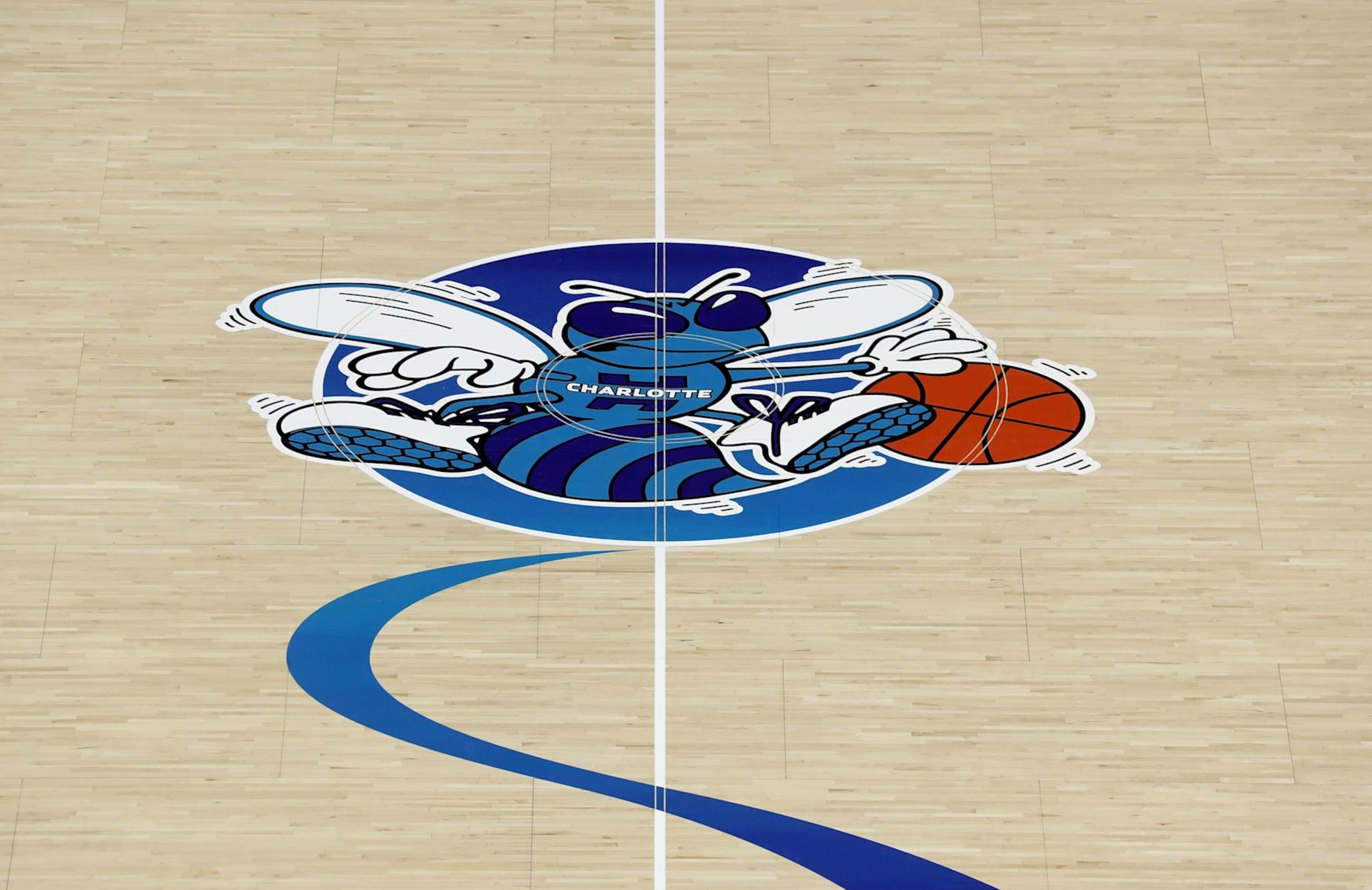 CHARLOTTE, NC - OCTOBER 17: A detailed view of the original logo of the Charlotte Hornets on display on the court ahead of opening night against the Milwaukee Bucks at Spectrum Center on October 17, 2018 in Charlotte, North Carolina. NOTE TO USER: User expressly acknowledges and agrees that, by downloading and or using this photograph, User is consenting to the terms and conditions of the Getty Images License Agreement. (Photo by Streeter Lecka/Getty Images) CHARLOTTE, NC - OCTOBER 17: A detailed view of the original logo of the Charlotte Hornets on display on the court ahead of opening night against the Milwaukee Bucks at Spectrum Center on October 17, 2018 in Charlotte, North Carolina. NOTE TO USER: User expressly acknowledges and agrees that, by downloading and or using this photograph, User is consenting to the terms and conditions of the Getty Images License Agreement. (Photo by Streeter Lecka/Getty Images)