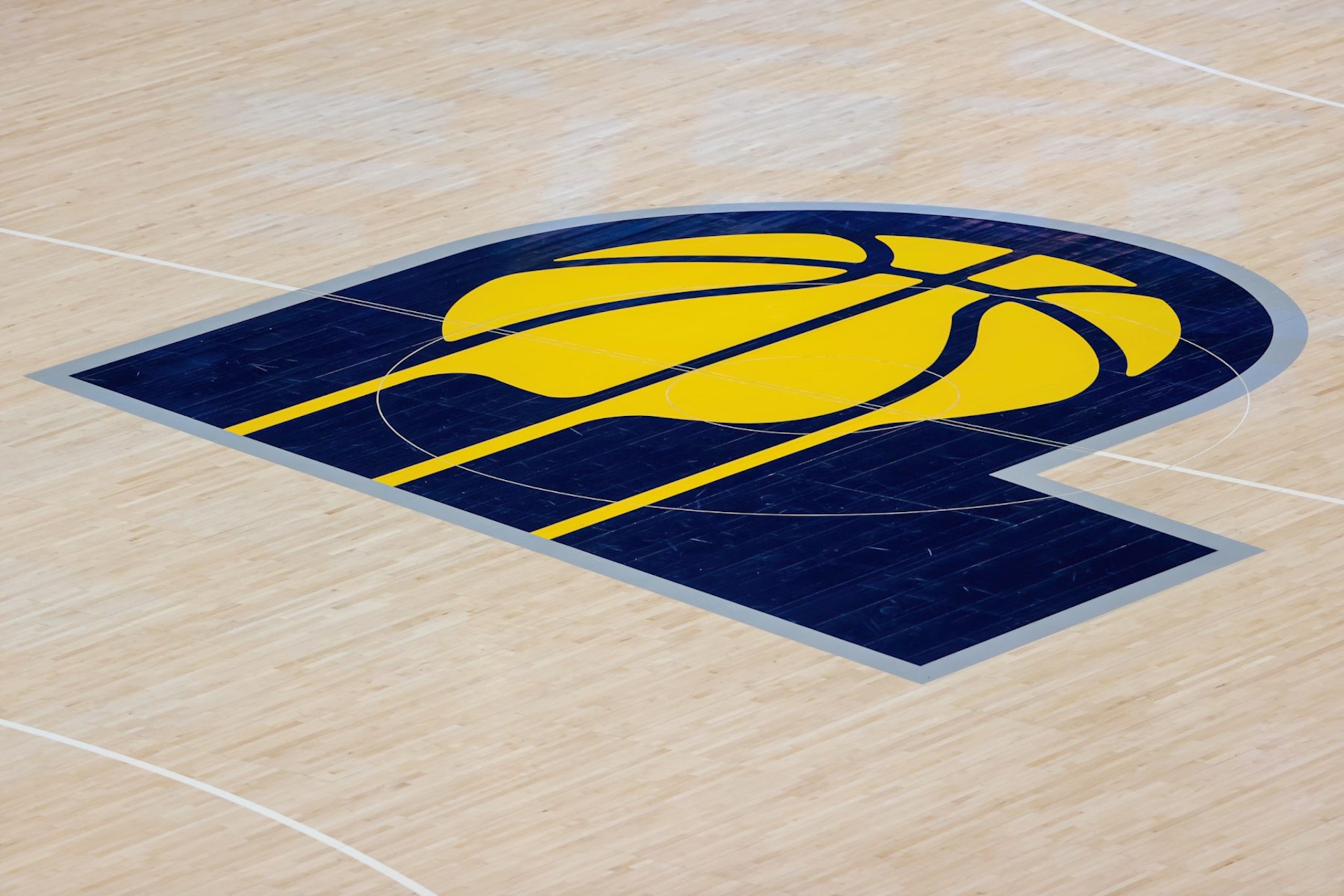 INDIANAPOLIS, INDIANA - APRIL 02: A general view of the Indiana Pacers logo on the court before the game between the Charlotte Hornets and Indiana Pacers at Bankers Life Fieldhouse on April 02, 2021 in Indianapolis, Indiana. NOTE TO USER: User expressly acknowledges and agrees that, by downloading and or using this photograph, User is consenting to the terms and conditions of the Getty Images License Agreement. (Photo by Dylan Buell/Getty Images) INDIANAPOLIS, INDIANA - APRIL 02: A general view of the Indiana Pacers logo on the court before the game between the Charlotte Hornets and Indiana Pacers at Bankers Life Fieldhouse on April 02, 2021 in Indianapolis, Indiana. NOTE TO USER: User expressly acknowledges and agrees that, by downloading and or using this photograph, User is consenting to the terms and conditions of the Getty Images License Agreement. (Photo by Dylan Buell/Getty Images)