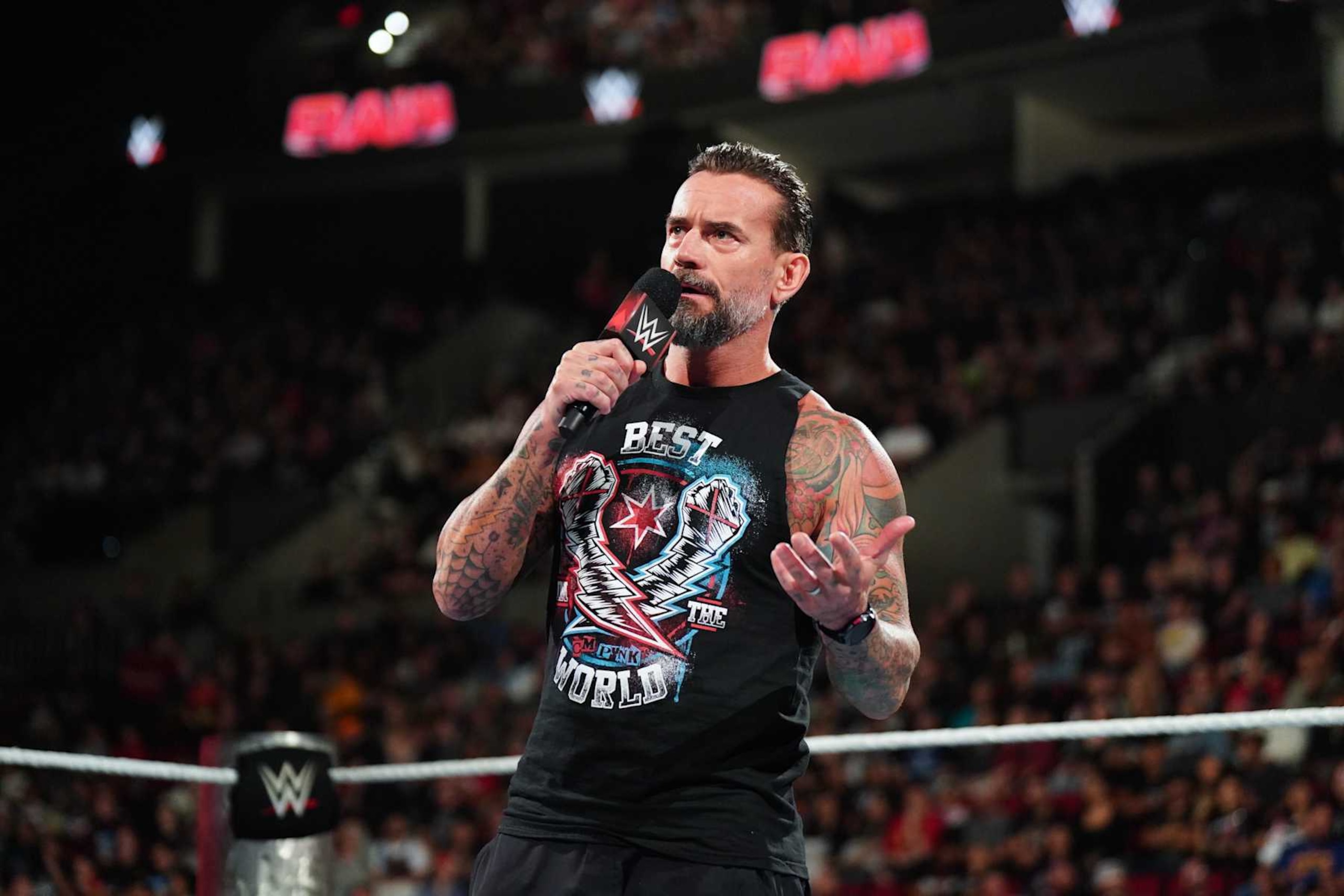 PORTLAND, OREGON - SEPTEMBER 16: CM Punk addresses the crowd during Monday Night RAW at Moda Center on September 16, 2024 in Portland, Oregon.  (Photo by WWE/Getty Images)