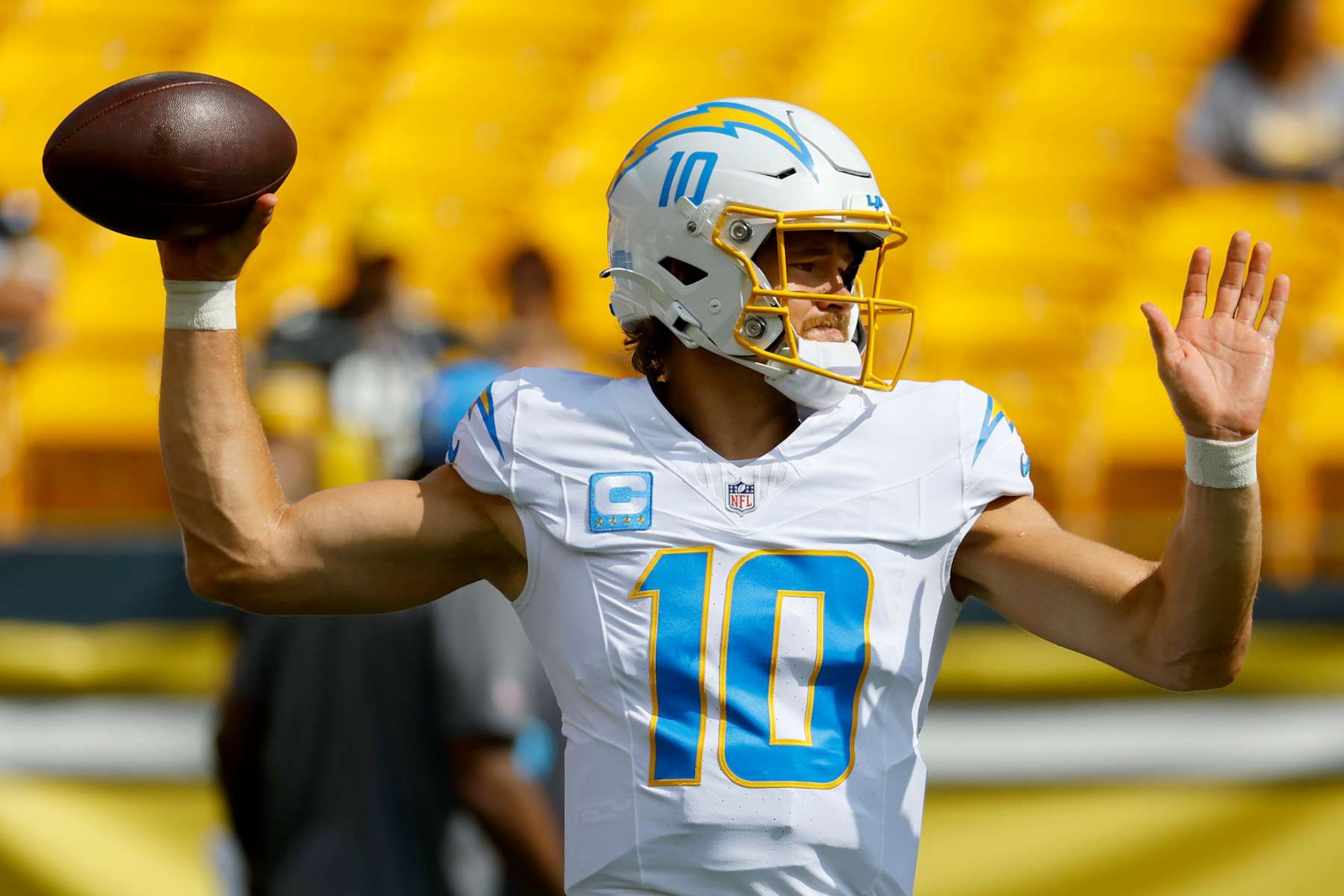 PITTSBURGH, PENNSYLVANIA - SEPTEMBER 22: Quarterback Justin Herbert #10 of the Los Angeles Chargers warms up prior to a game against the Pittsburgh Steelers at Acrisure Stadium on September 22, 2024 in Pittsburgh, Pennsylvania. (Photo by Justin K. Aller/Getty Images)