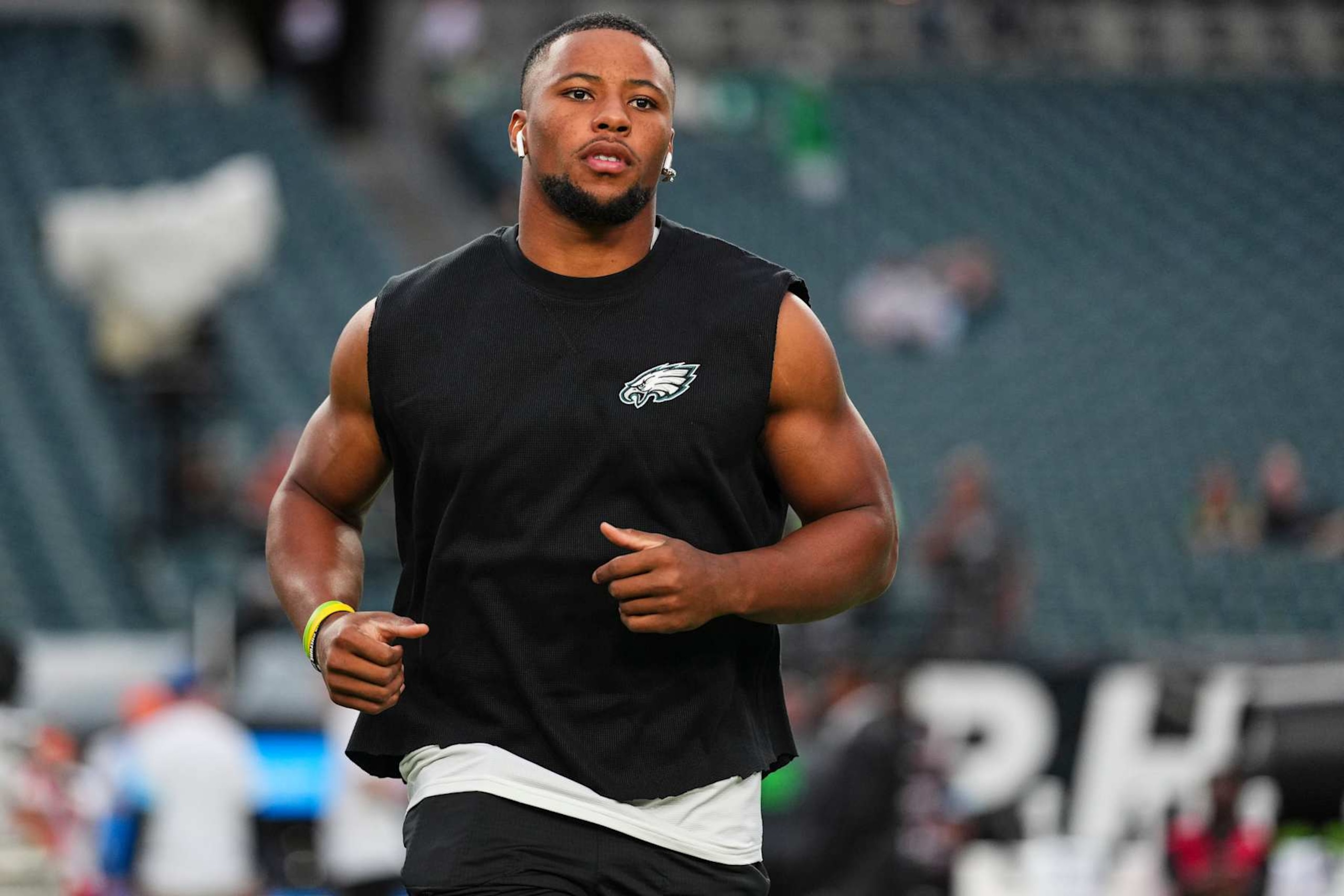 PHILADELPHIA, PA - SEPTEMBER 16: Saquon Barkley #26 of the Philadelphia Eagles warms up prior to an NFL football game against the Atlanta Falcons at Lincoln Financial Field on September 16, 2024 in Philadelphia, Pennsylvania. (Photo by Cooper Neill/Getty Images) PHILADELPHIA, PA - SEPTEMBER 16: Saquon Barkley #26 of the Philadelphia Eagles warms up prior to an NFL football game against the Atlanta Falcons at Lincoln Financial Field on September 16, 2024 in Philadelphia, Pennsylvania. (Photo by Cooper Neill/Getty Images)