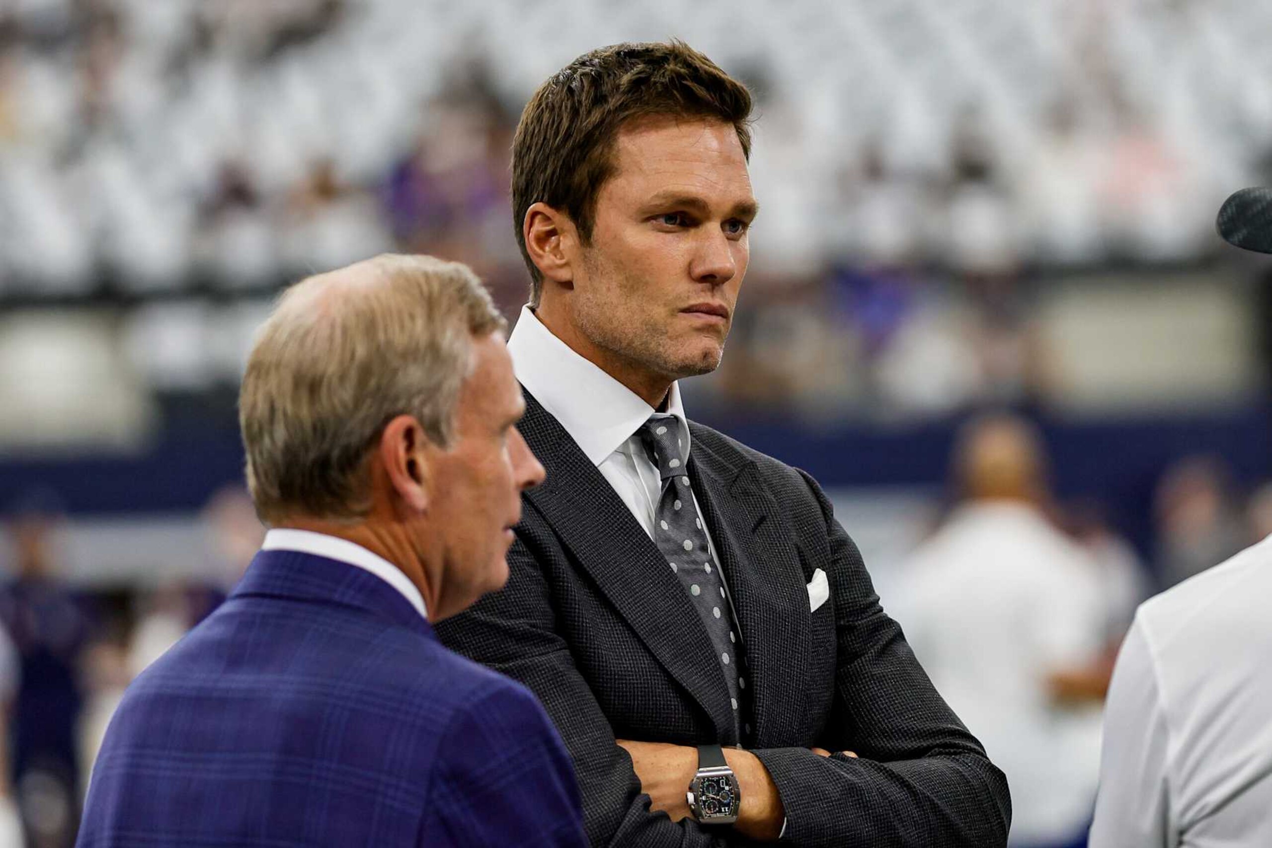ARLINGTON, TX - SEPTEMBER 22: FOX football analyst Tom Brady visits with the players before the game between the Dallas Cowboys and the Baltimore Ravens on September 22, 2024 at AT&T Stadium in Arlington, Texas. (Photo by Matthew Pearce/Icon Sportswire via Getty Images)