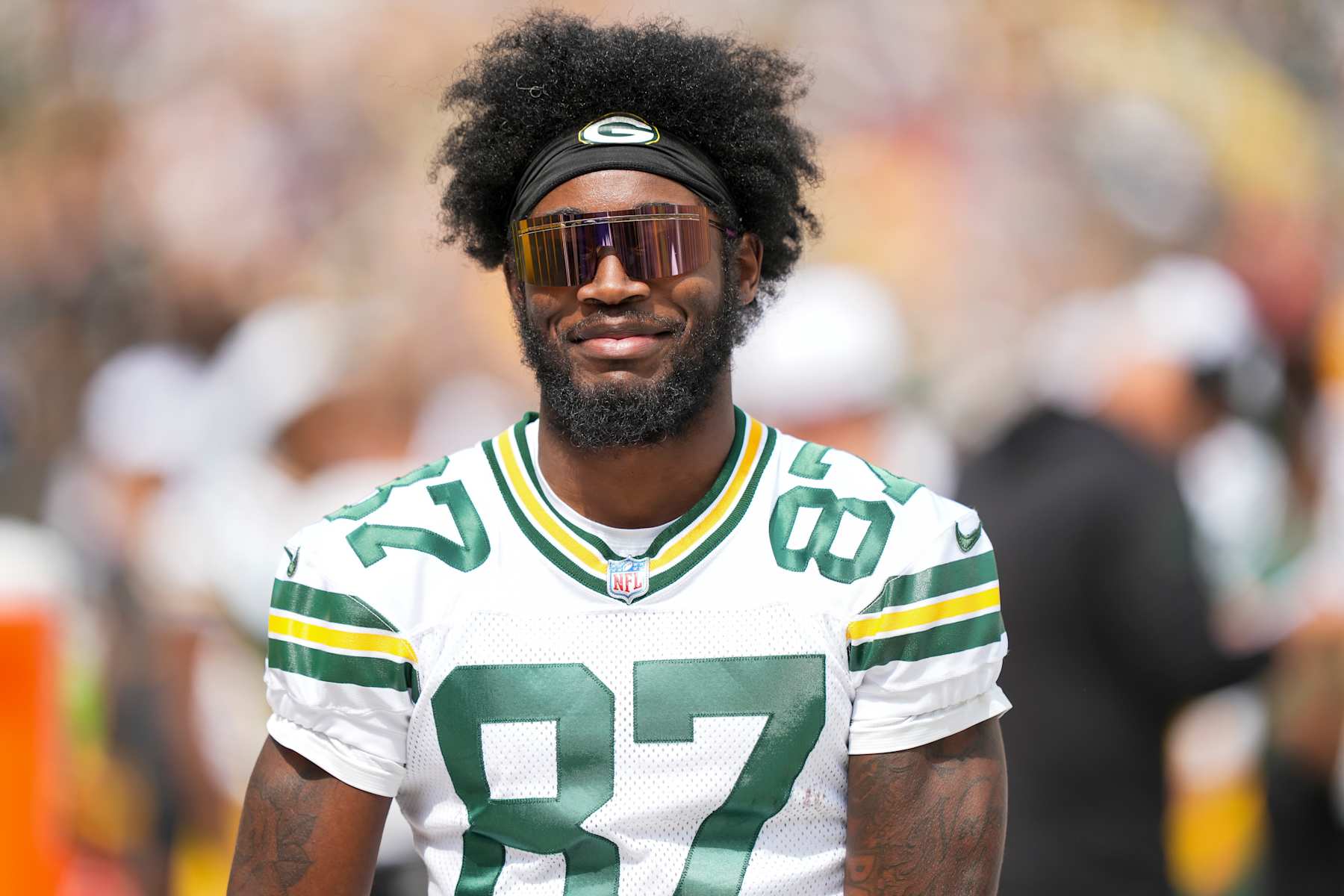 GREEN BAY, WISCONSIN - AUGUST 24: Wide receiver Romeo Doubs #87 of the Green Bay Packers stands on the sidelines during the third quarter of an NFL preseason football game against the Baltimore Ravens, at Lambeau Field on August 24, 2024 in Green Bay, Wisconsin. (Photo by Todd Rosenberg/Getty Images)