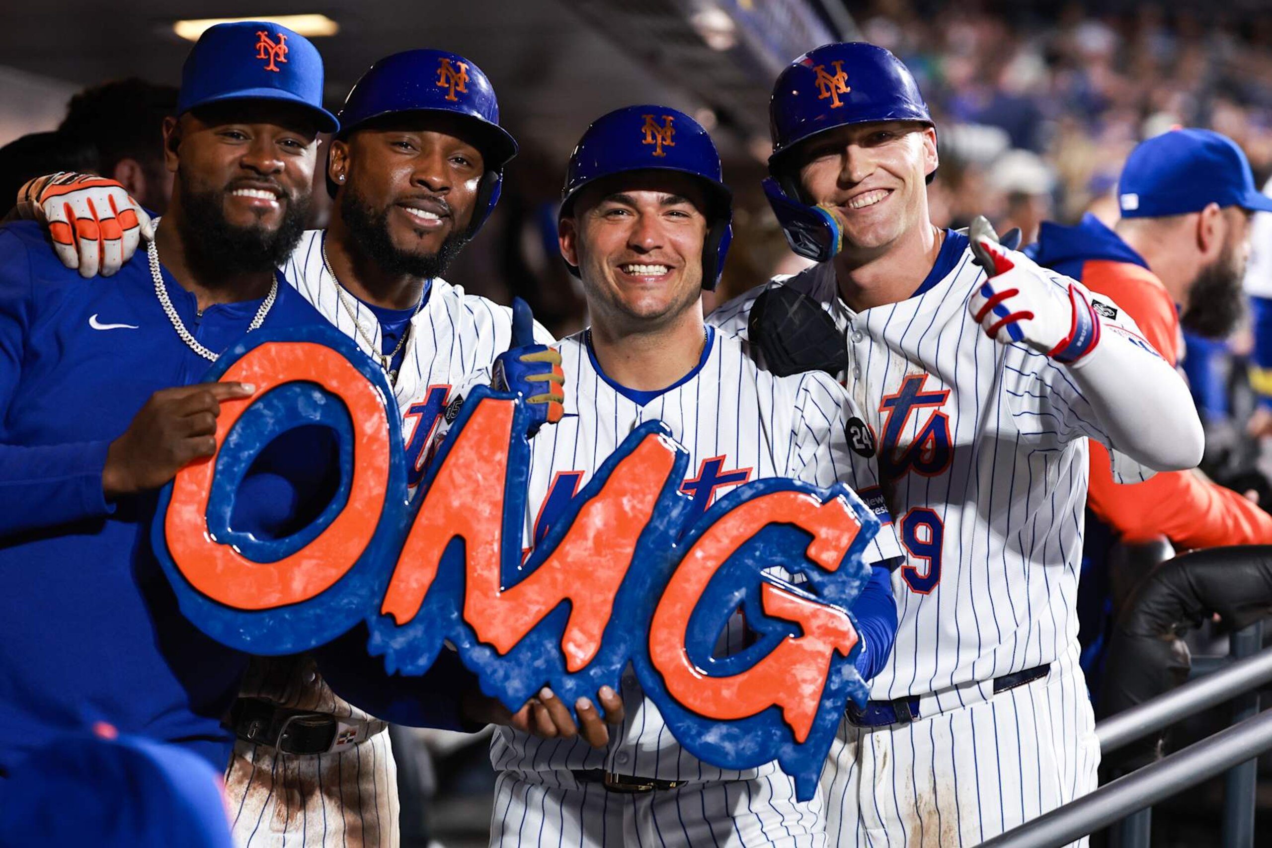 NEW YORK, NEW YORK - SEPTEMBER 18: Brandon Nimmo #9, Jose Iglesias #11, Starling Marte #6 and Luis Severino #40 of the New York Mets pose for a photo after Nimmo hit a three-run home run during the fourth inning of the game against the Washington Nationals at Citi Field on September 18, 2024 in New York City. (Photo by Dustin Satloff/Getty Images)